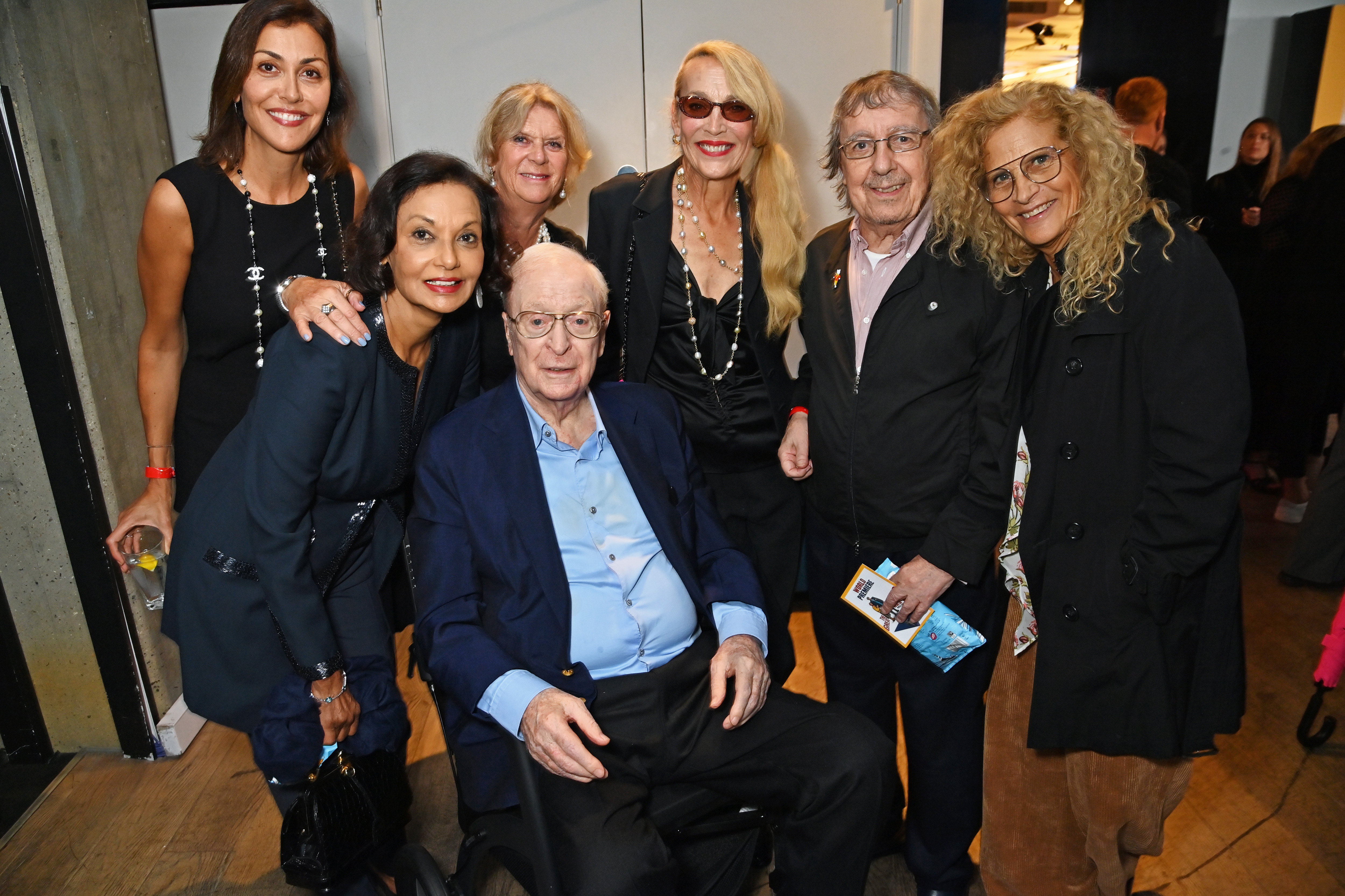 (L to R) Natasha Caine, Shakira Caine, Nikki Caine, Michael Caine, Jerry Hall, Bill Wyman and Suzanne Wyman at the world premiere of "The Great Escaper," September 2023 | Source: Getty Images
