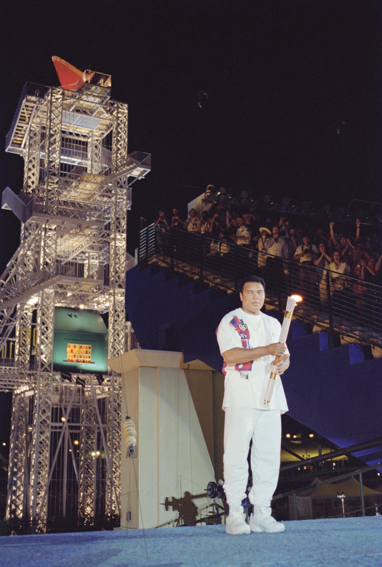 Muhammad Ali carries the Olympic Flame during the Opening Ceremony of the XXVI Summer Olympic Games on July 19, 1996, in Atlanta, Georgia. | Source: Getty Images