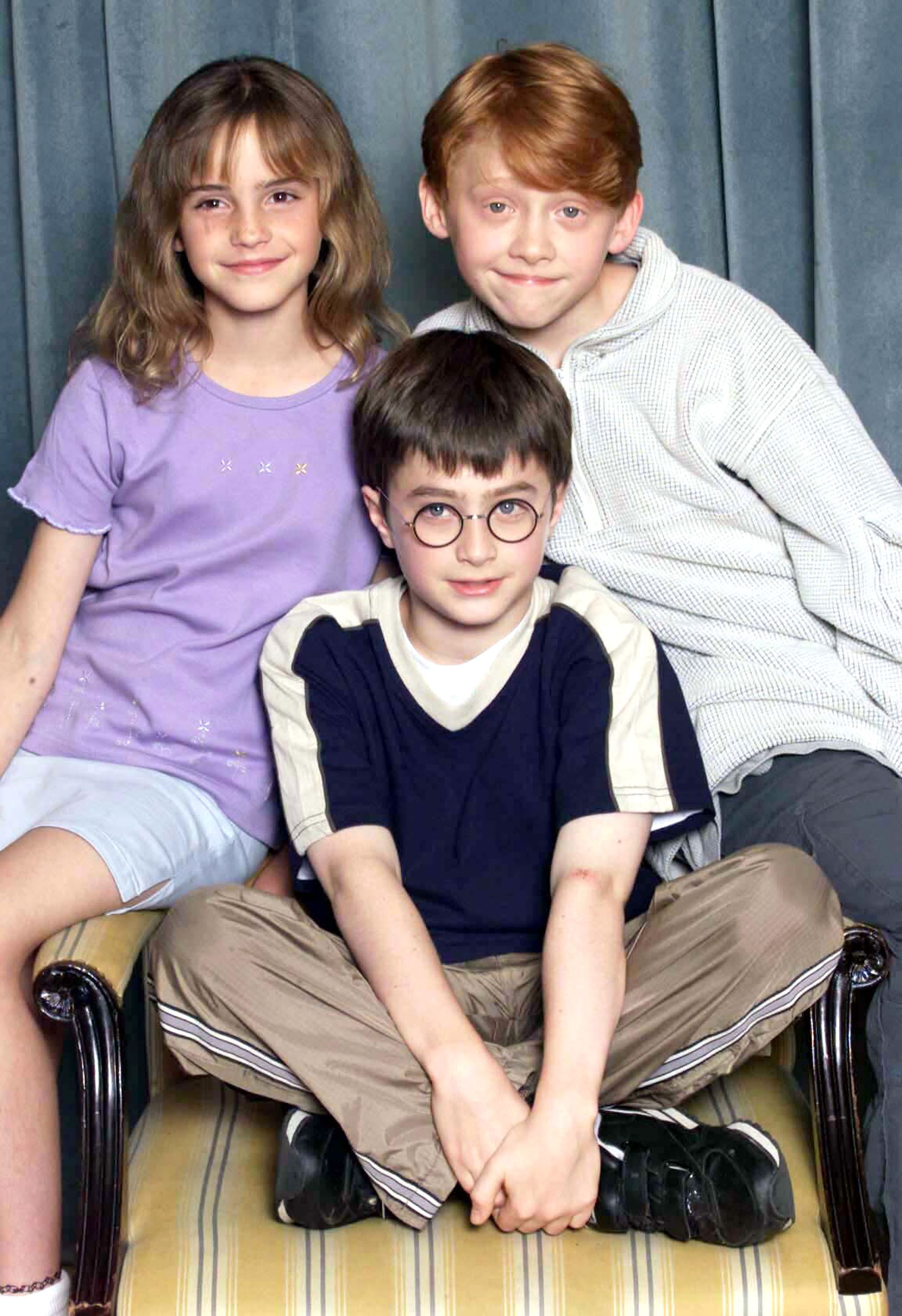 Emma Watson, Daniel Radcliffe, and Rupert Grint at a photocall for "Harry Potter" in London, England on August 23, 2000 | Source: Getty Images