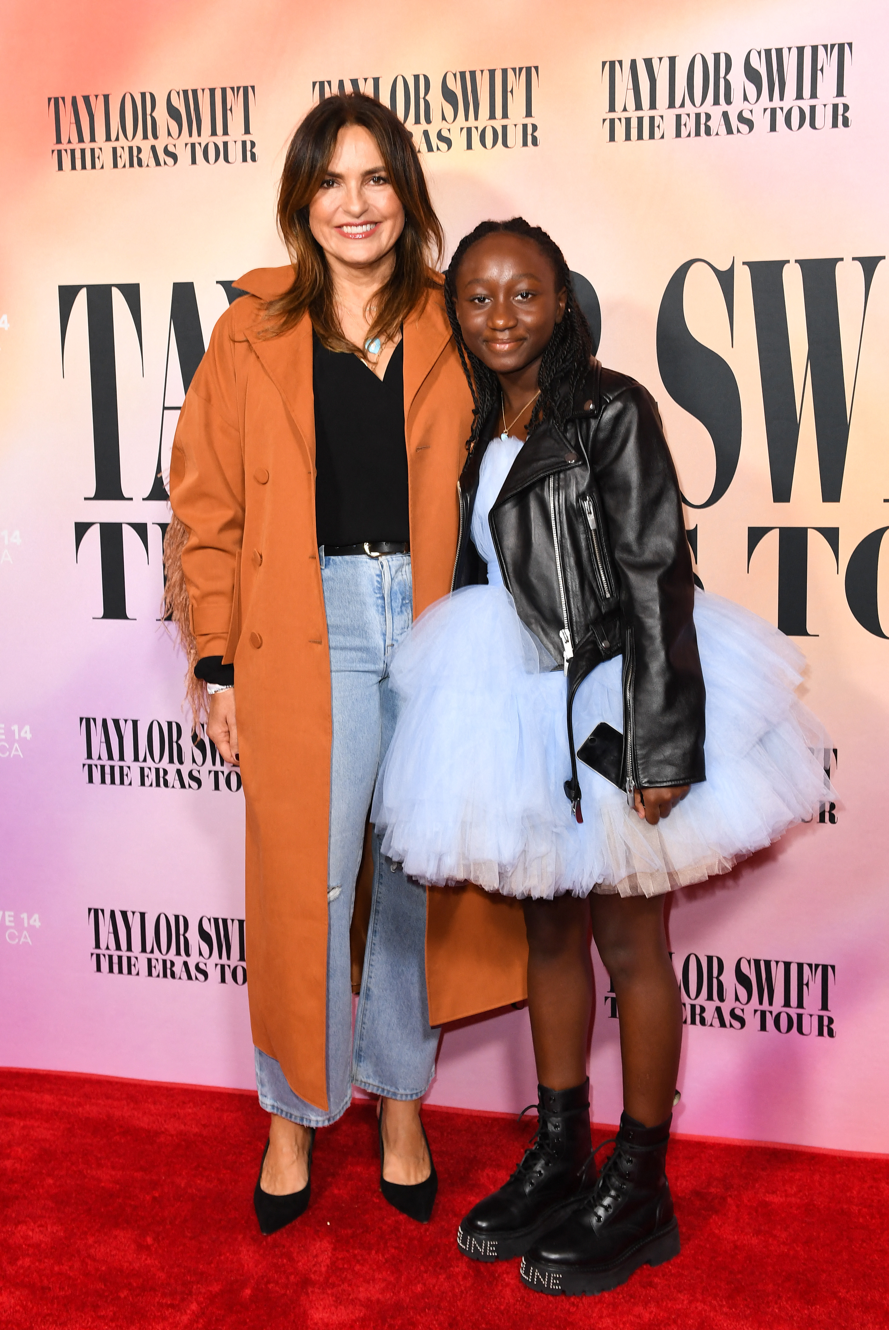 Mariska Hargitay and her daughter Amaya Hermann happily pose for a picture at "Taylor Swift: The Eras Tour" concert movie world premiere on October 11, 2023 in Los Angeles, California | Source: Getty Images