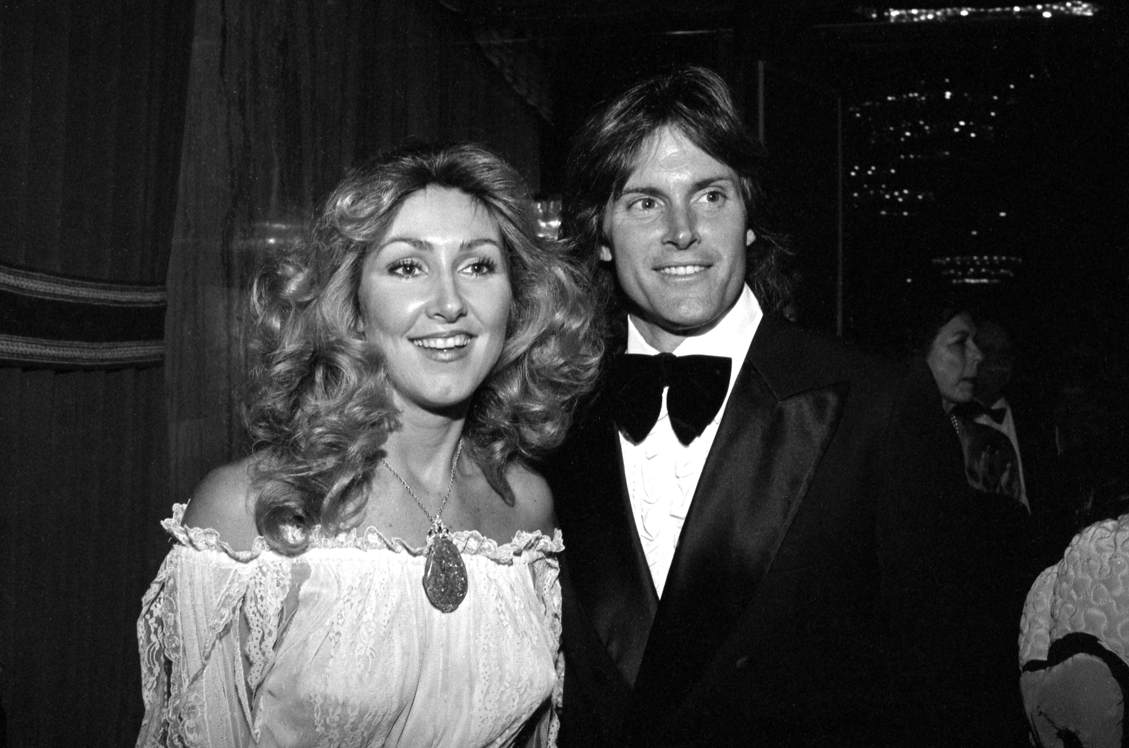 Linda Thompson and Bruce Jenner (before transitioning) posing in a black and white photograph in 1984 | Source: Getty Images