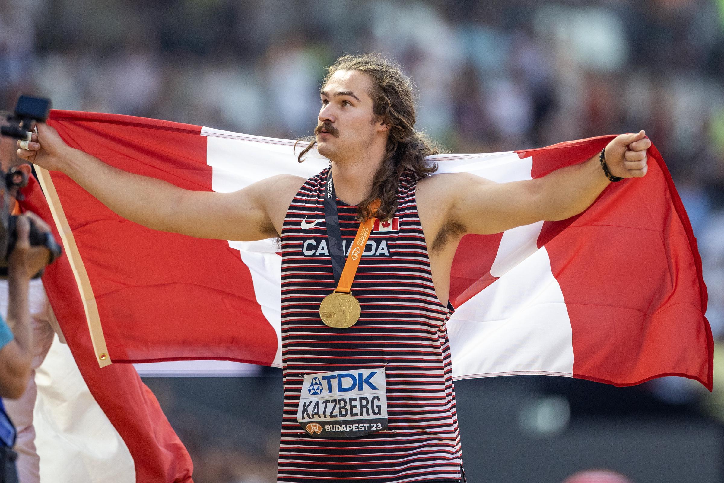 Ethan Katzberg of Canada with his gold medal after winning the Men's Hammer Throw during the World Athletics Championships, at the National Athletics Centre on August 20th, 2023, in Budapest, Hungary. | Source: Getty Images