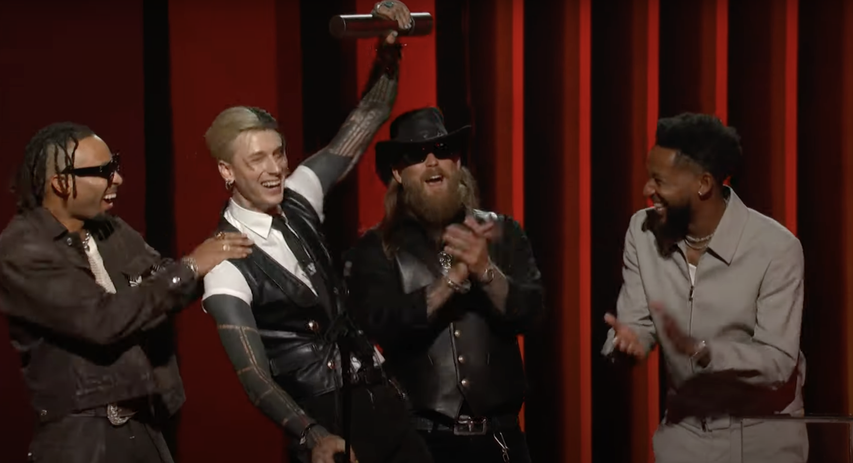 Machine Gun Kelly accepts his award onstage during the 2024 Peoples Choice Country Awards | Source: YouTube/NBC