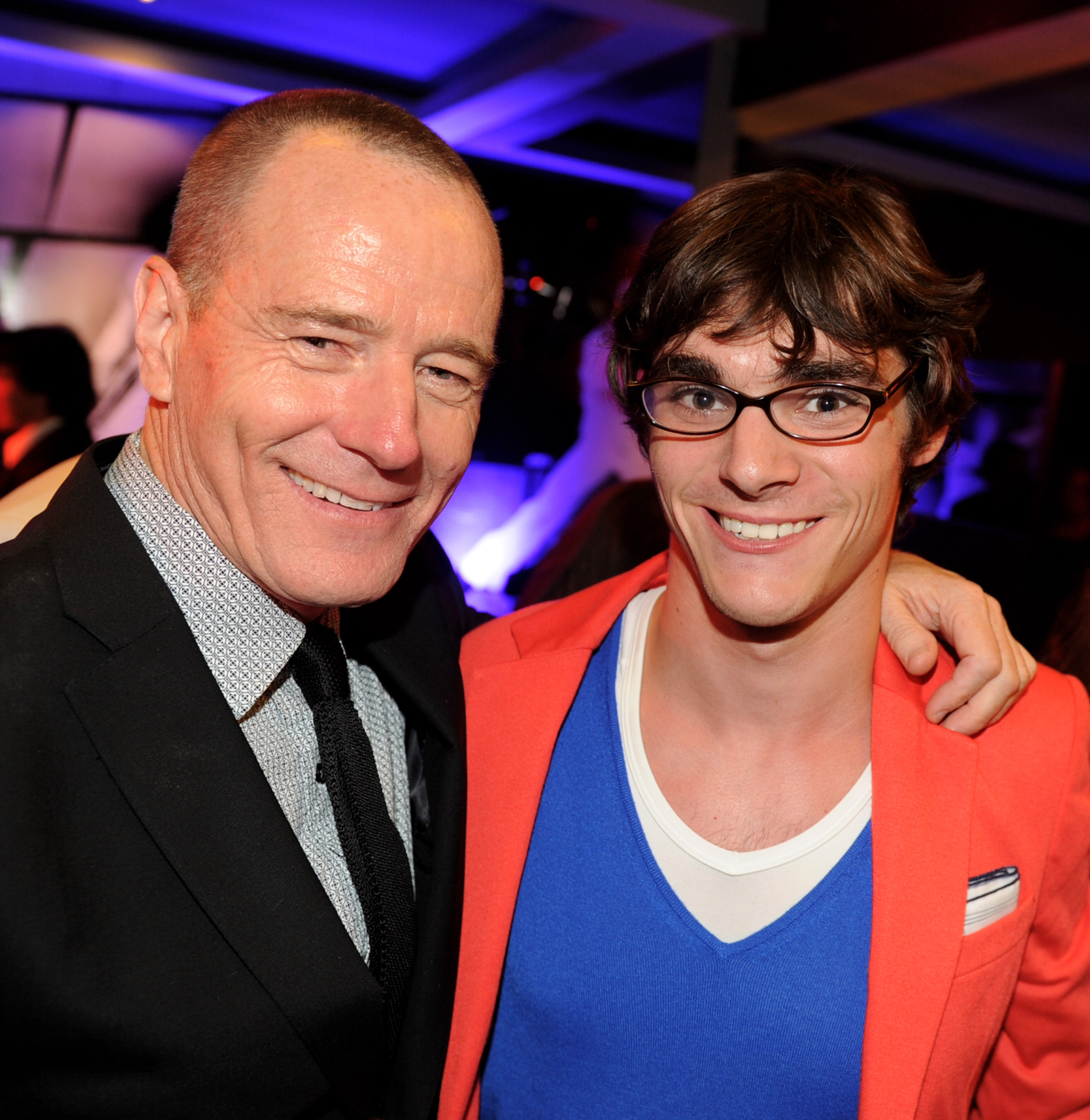 Bryan Cranston (L) and RJ Mitte pose at the after party for the premiere of Universal Pictures' "Larry Crowne" at the Rolling Stone Restaurant on June 27, 2011 in Los Angeles, California. | Source: Getty Images