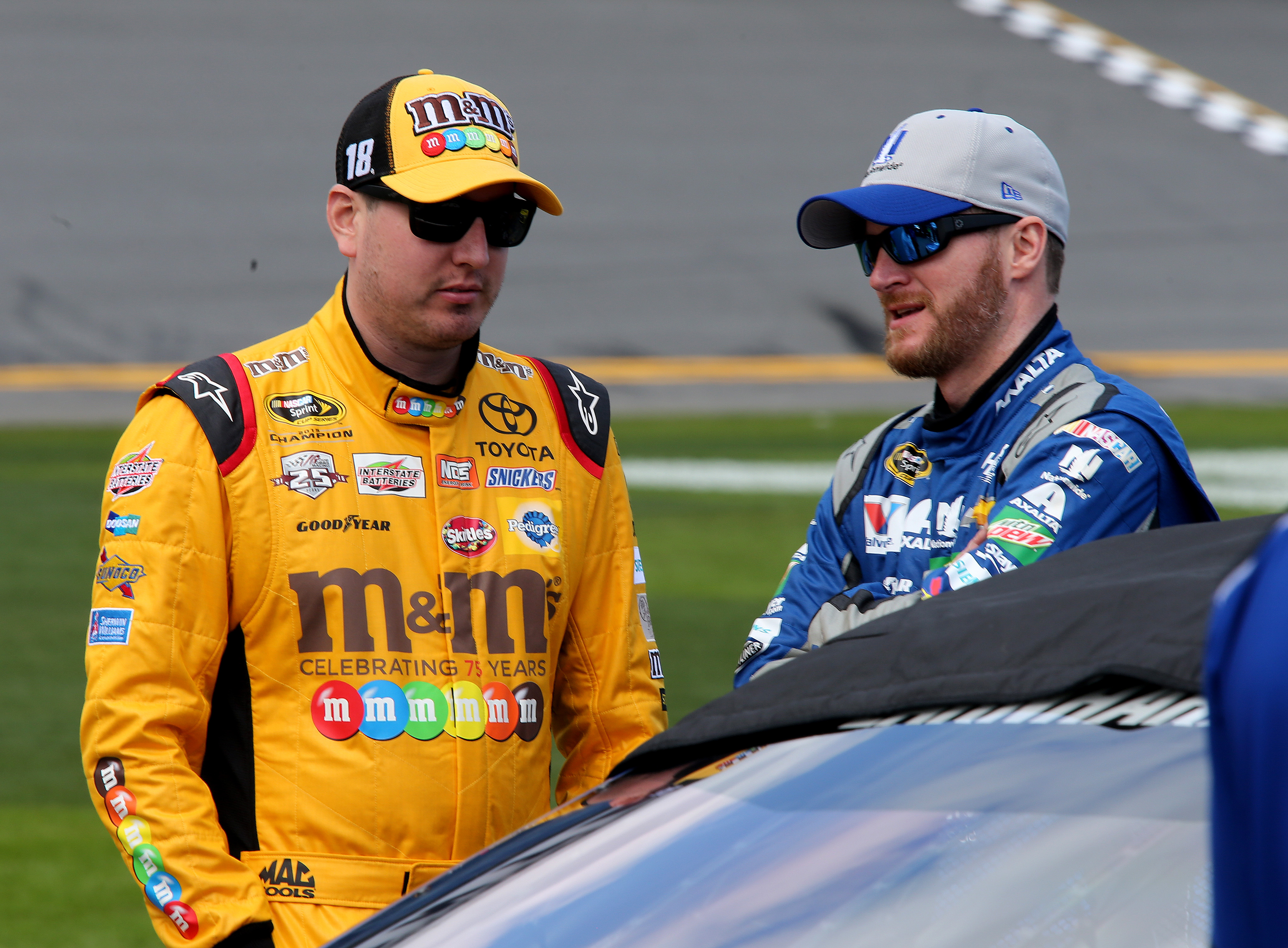 Kyle Busch and Dale Earnhardt Jr. during qualifying for the NASCAR Sprint Cup Series Daytona 500 in Daytona Beach, Florida on February 14, 2016. | Source: Getty Images