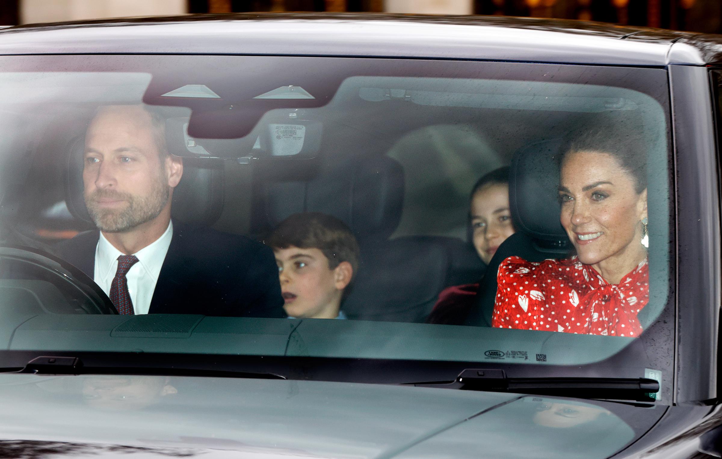 The full picture came into view as the entire Wales family appeared united once again, with Prince Louis and Catherine, Princess of Wales, joining the group inside the car. Catherine's vibrant red ensemble and warm smile added a festive flourish to the occasion, underscoring the significance of their attendance after a year's absence.