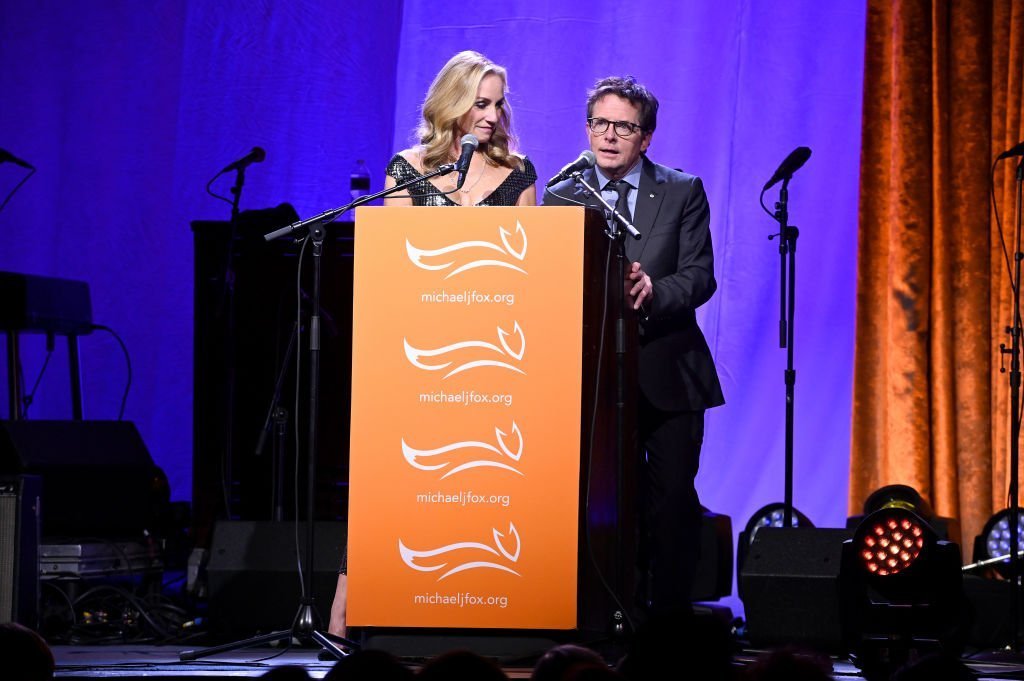 Tracy Pollan and Michael J. Fox speak on stage at A Funny Thing Happened On The Way To Cure Parkinson's | Getty Images