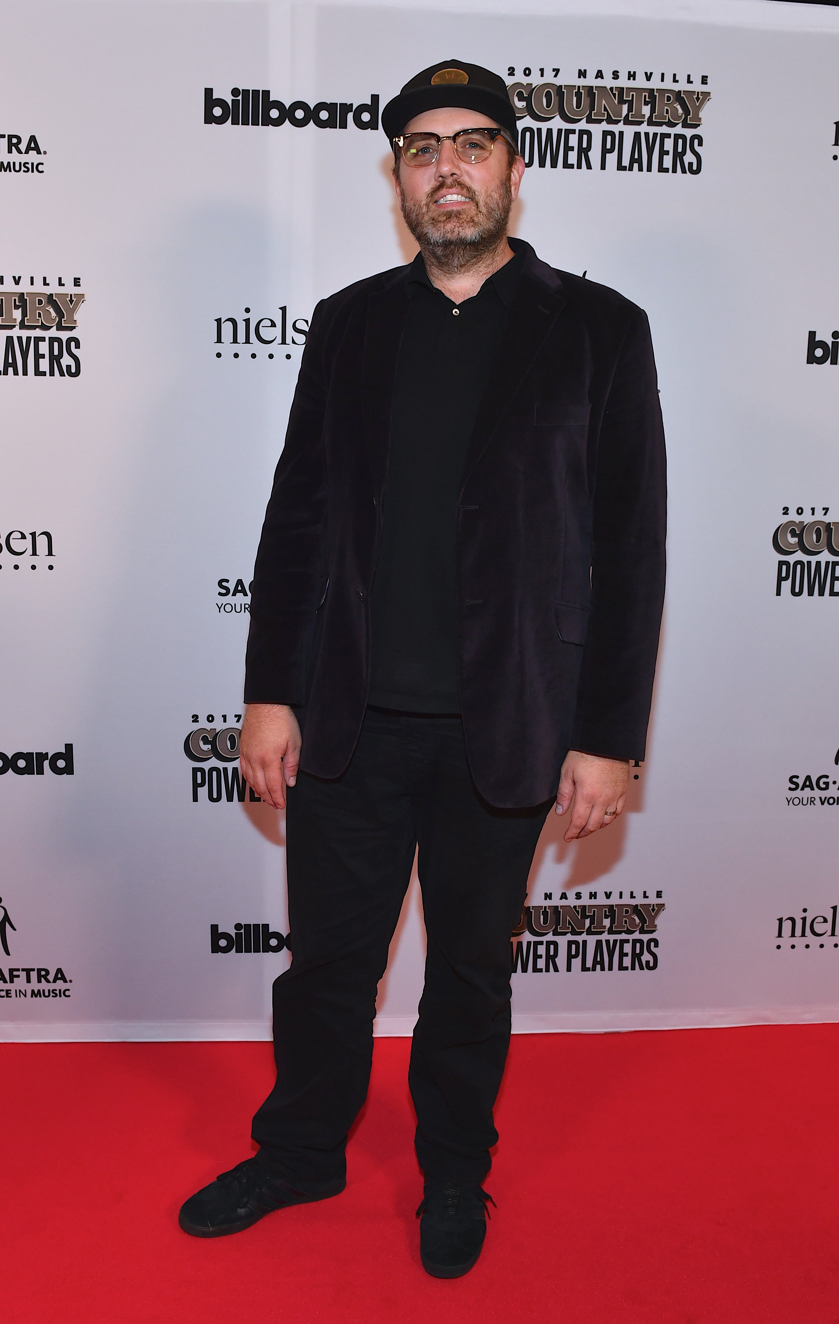 Busbee arrives at the 2017 Billboard Country Power Players on August 1, 2017 | Photo: GettyImages