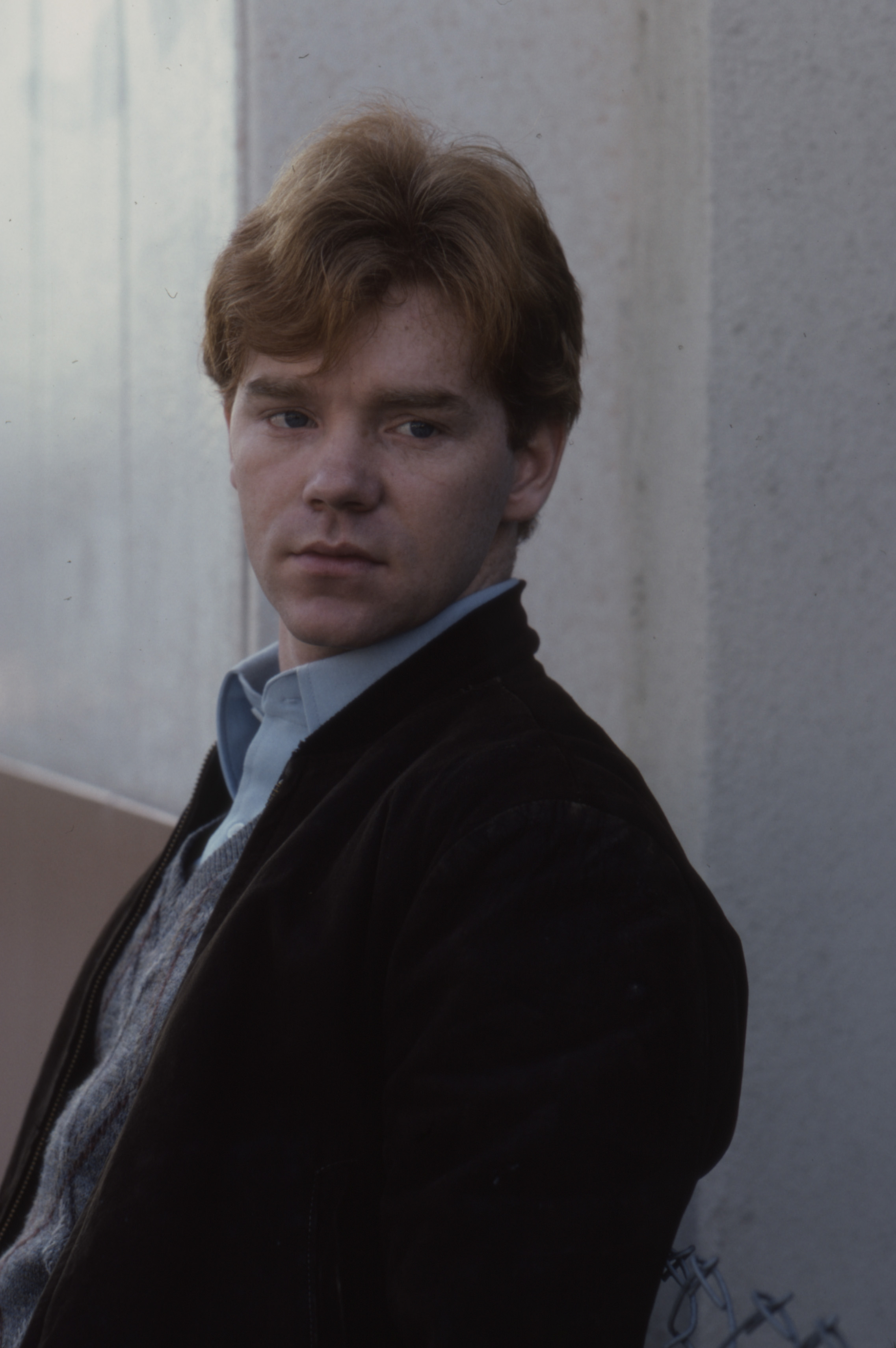 David Caruso looks pensive in a dark jacket and pale blue shirt while appearing in the 1981 ABC TV movie "Crazy Times," an early screen role that captured him with a serious, youthful gaze.