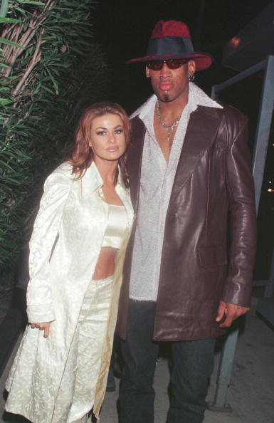 Dennis Rodman and Carmen Electra in Beverly Hills, CA, February 26, 1999. | Photo: Getty Images