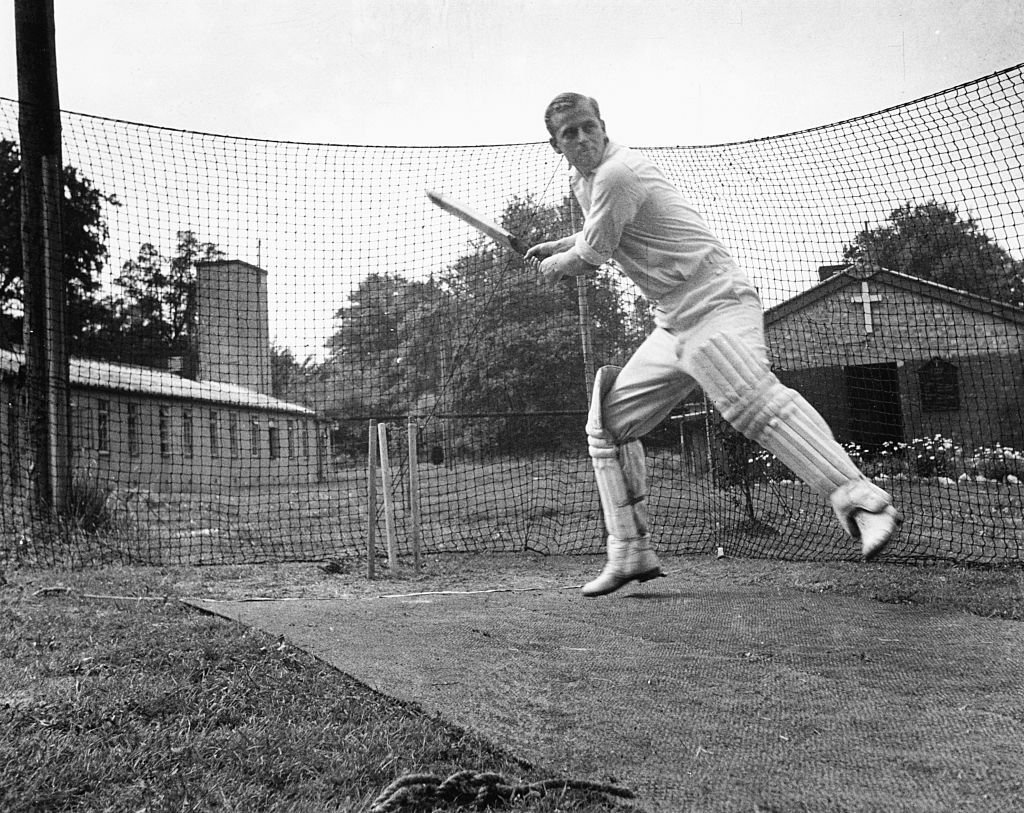 Philip Mountbatten, prior to his marriage to Princess Elizabeth, batting at the nets during cricket practice while in the Royal Navy | Getty Images