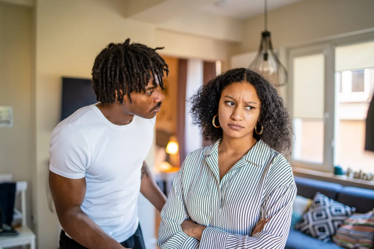 A frowning woman after an argument with her husband | Source: Getty Images