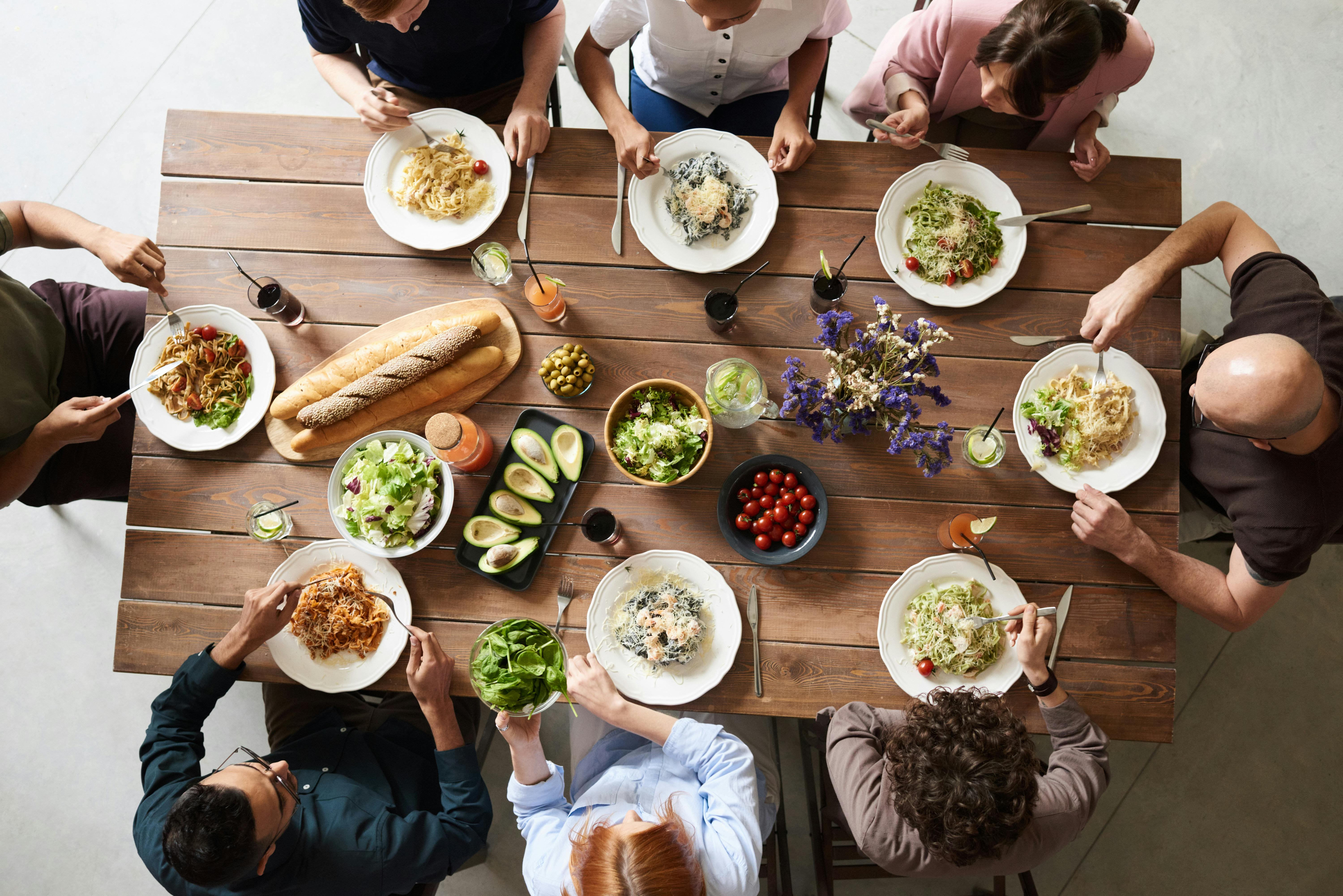 A family sharing a meal together | Source: Pexels