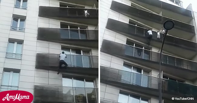 Migrant risks his life to save child dangling from a balcony in Paris