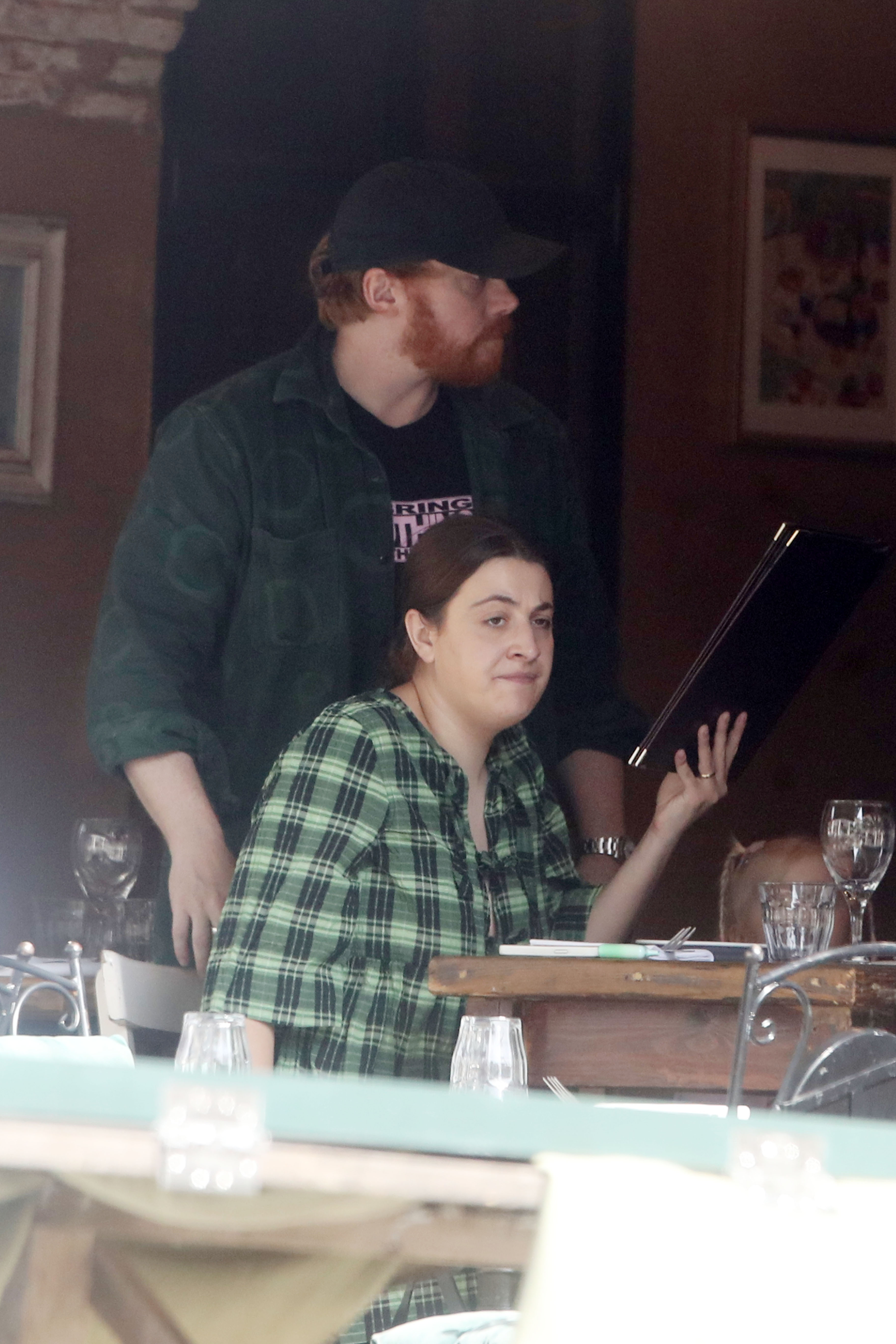 Rupert Grint and Georgia Groome seen at the Gare du Nord on March 22, 2024, in Paris, France | Source: Getty Images