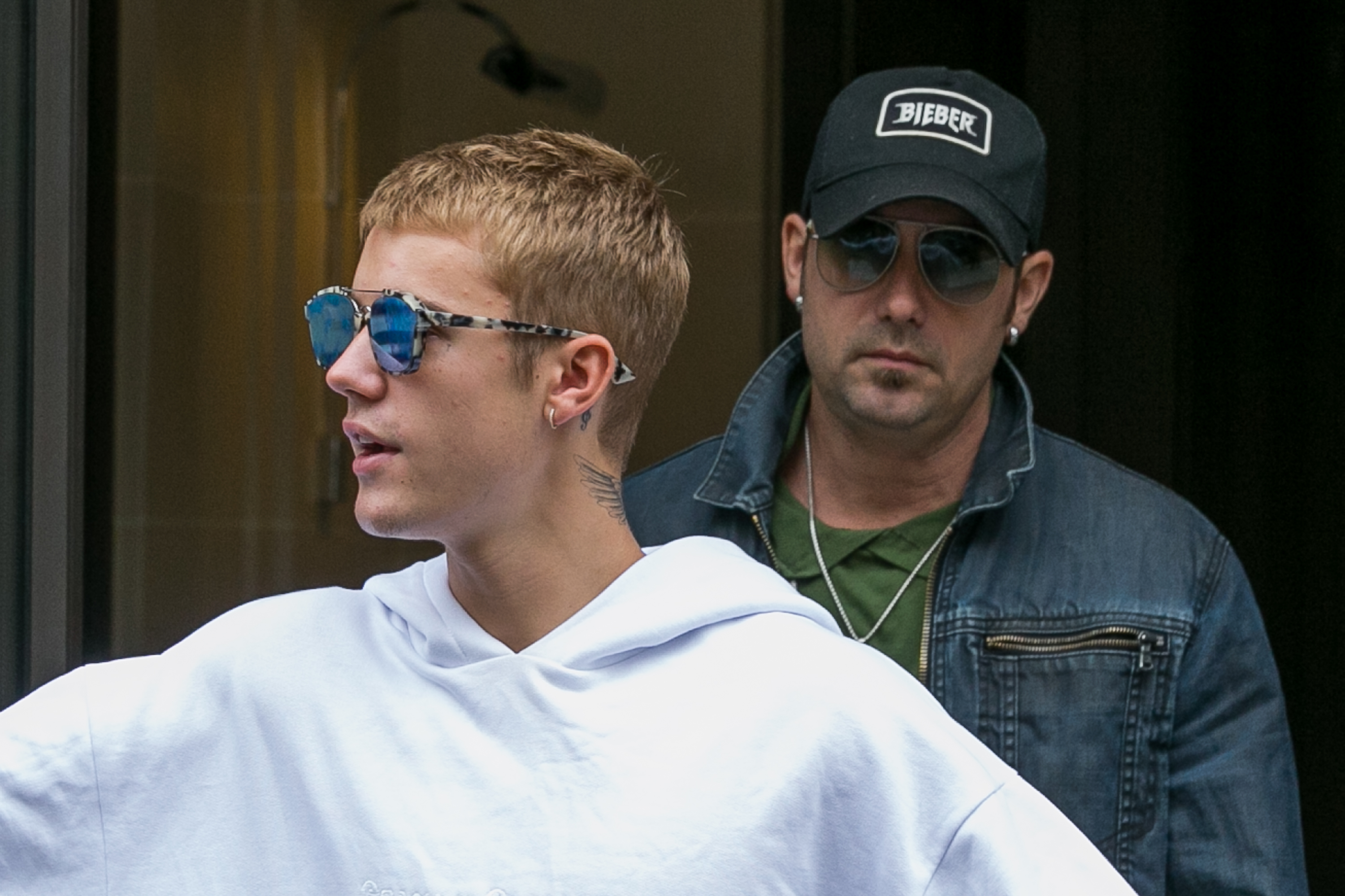 Justin Bieber and Jeremy Bieber seen exiting a building in Paris, France, on September 19, 2016. | Source: Getty Images