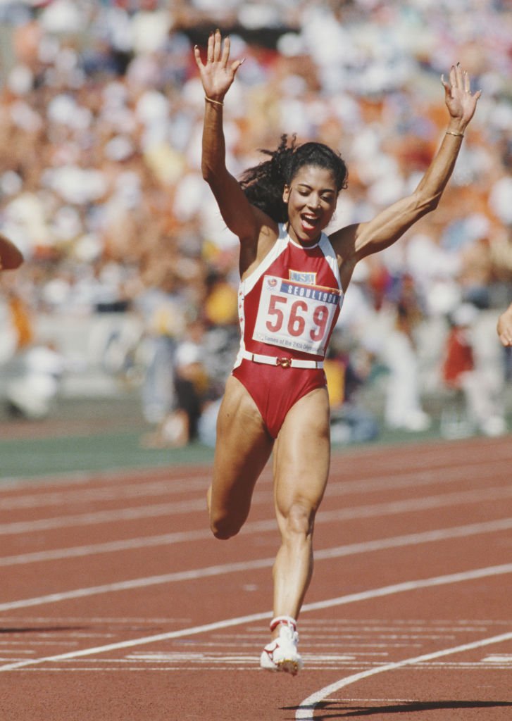 Florence Griffith-Joyner during her winning moment in the Women's 100 meters final event during the XXIV Summer Olympic Games at the Seoul Olympic Stadium in Seoul, South Korea on September 25, 1988. | Photo: Getty Images