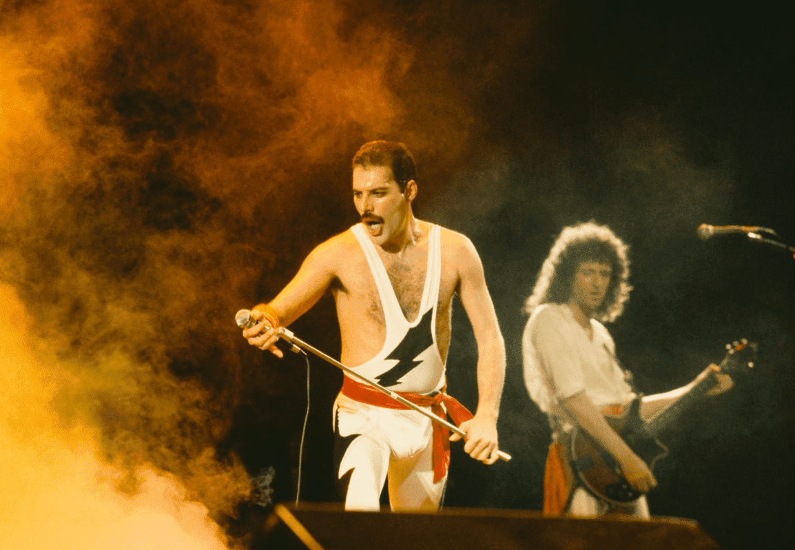 Freddie Mercury and Brian May on stage during Queen's performance at the Rock in Rio festival, Brazil, January 1985. | Source: Getty Images