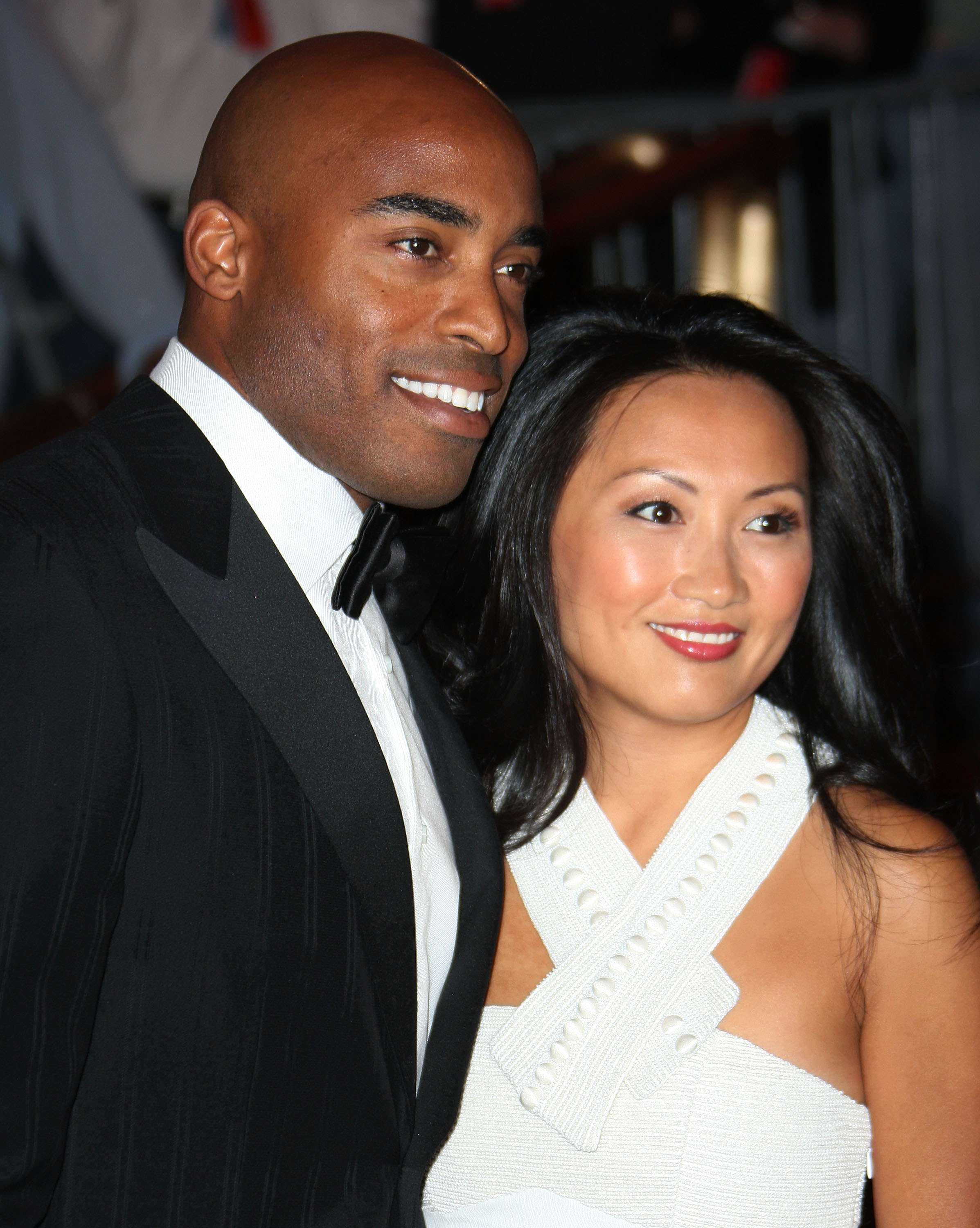 Tiki Barber and Ginny Cha arrive at the Metropolitan Museum of Art Costume Institute Gala, Superheroes: Fashion and Fantasy, held at the Metropolitan Museum of Art on May 5, 2008, in New York City. | Source: Getty Images