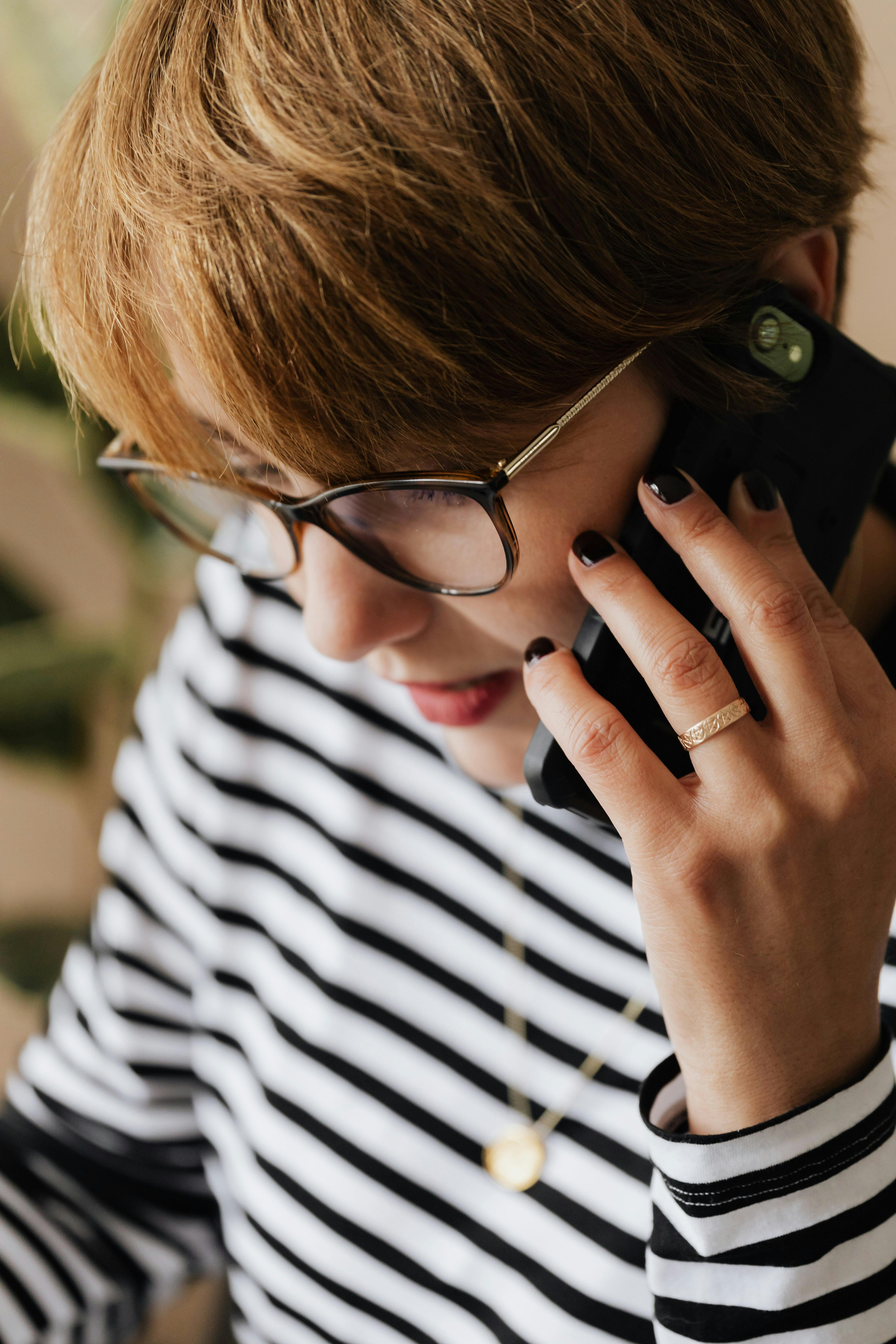 Adult woman on phone call | Source: Pexels