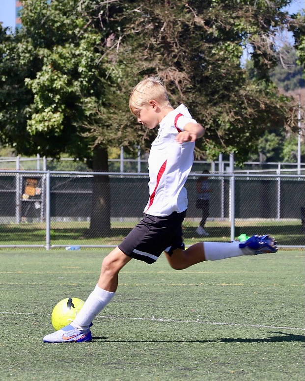 Fergie's son Axl Duhamel playing soccer, from her birthday tribute posted on August 29, 2025 | Source: Instagram/fergie