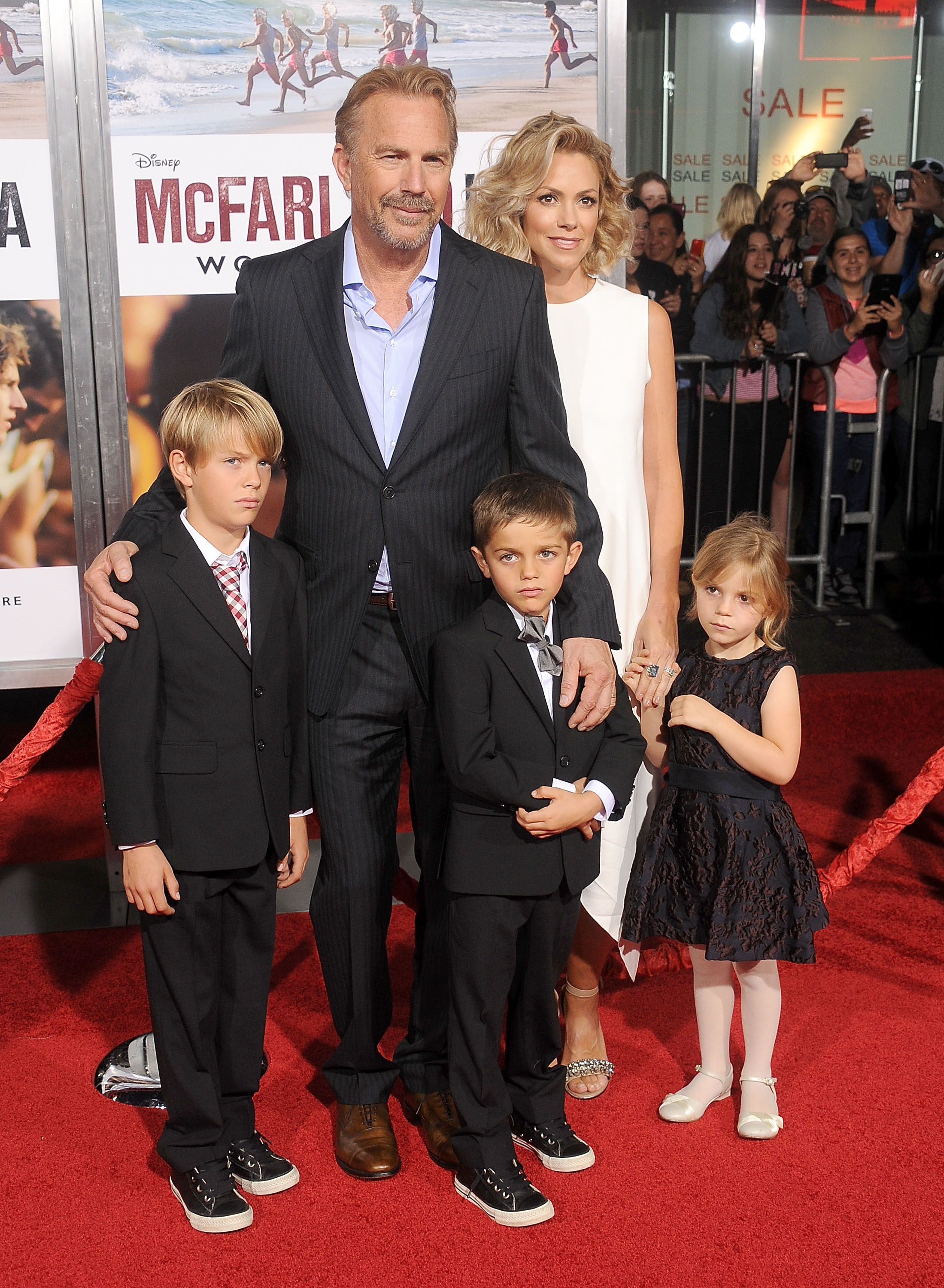 Kevin Costner, Christine Baumgartner and their kids Grace Avery, Hayes Logan, and Cayden Wyatt Costner at the World Premiere of "McFarland, USA" in Hollywood, California, on February 9, 2015. | Source: Getty Images