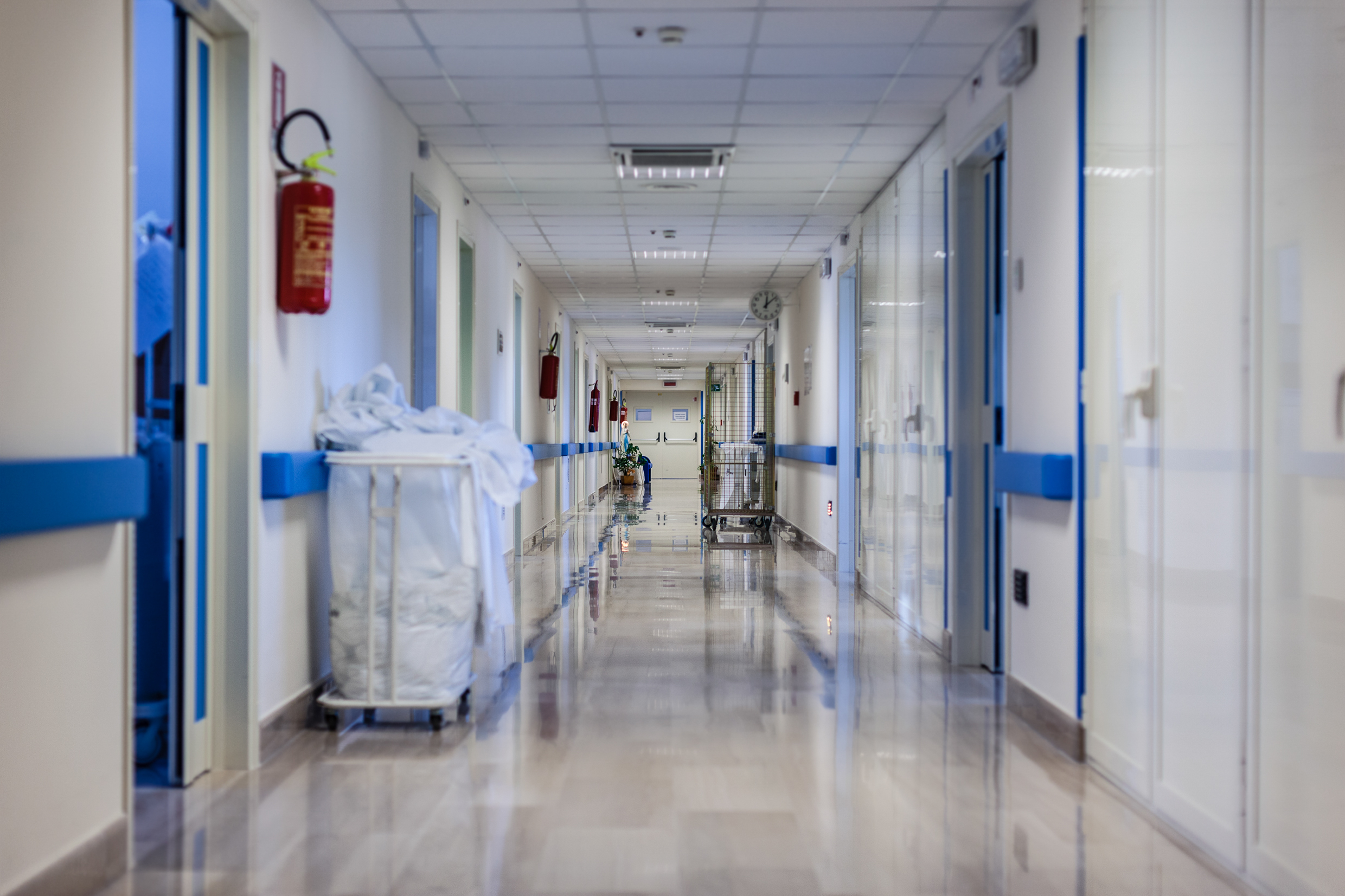 Clean and empty hospital corridor with nobody on sight | Source: Shutterstock.com