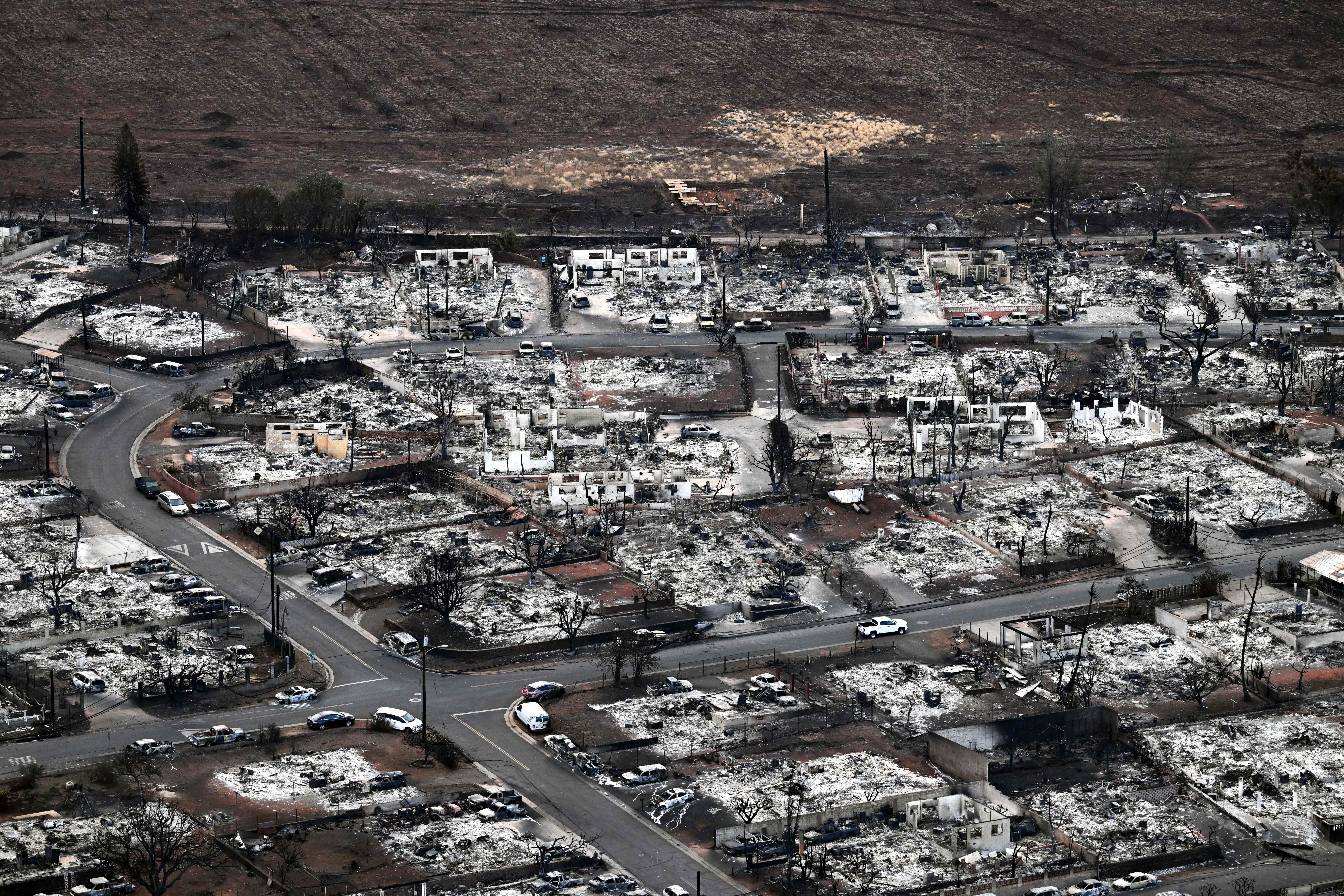 An aerial photo taken on August 10, 2023 shows the damage caused by the wildfires in Lahaina, Hawaii. | Source: Getty Images