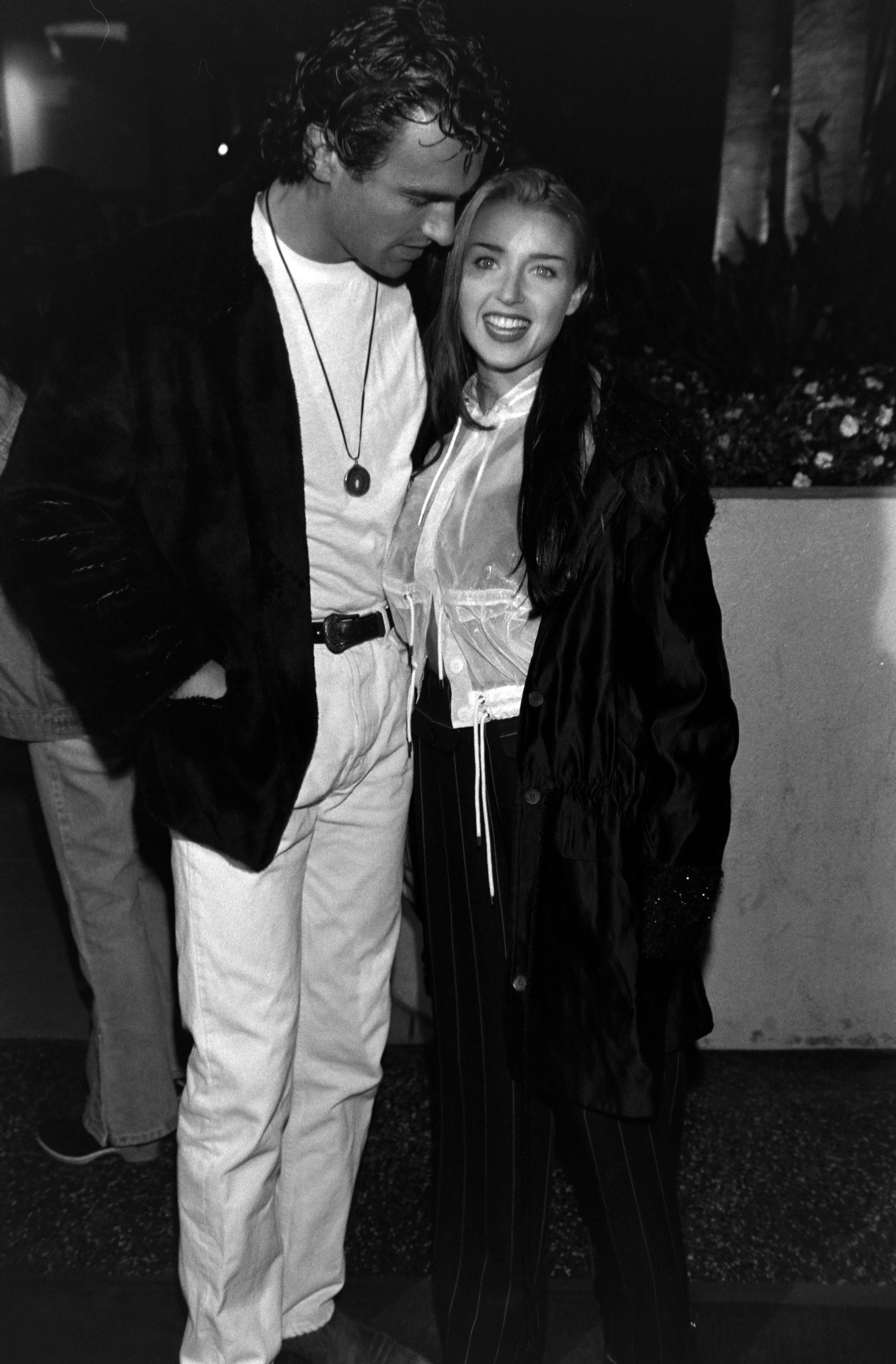Julian McMahon and Dannii Minogue attend an event at the Hollywood Galaxy Theater on February 10, 1993, in Los Angeles, California | Source: Getty Images