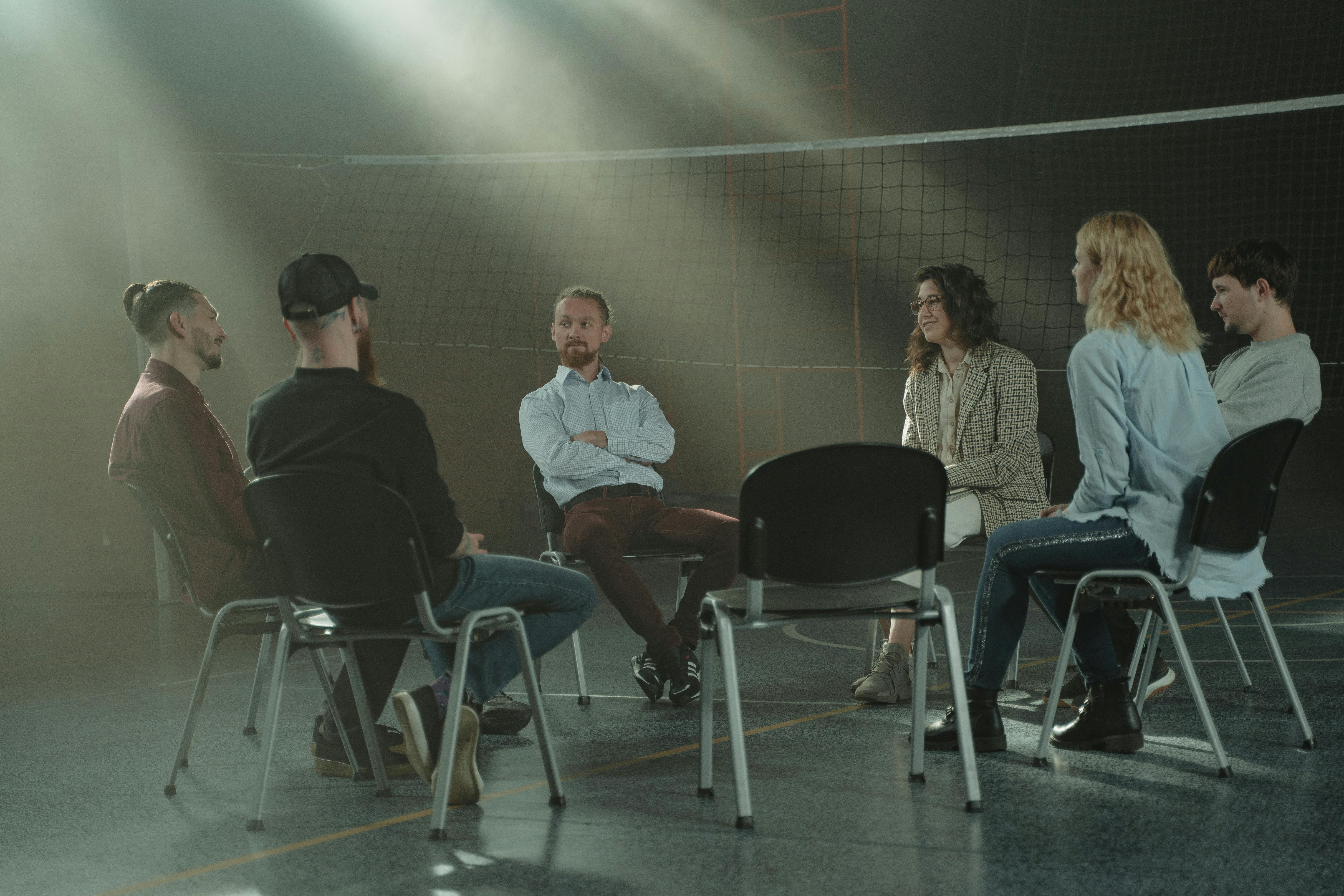 A group of people sitting in a community center | Source: Pexels