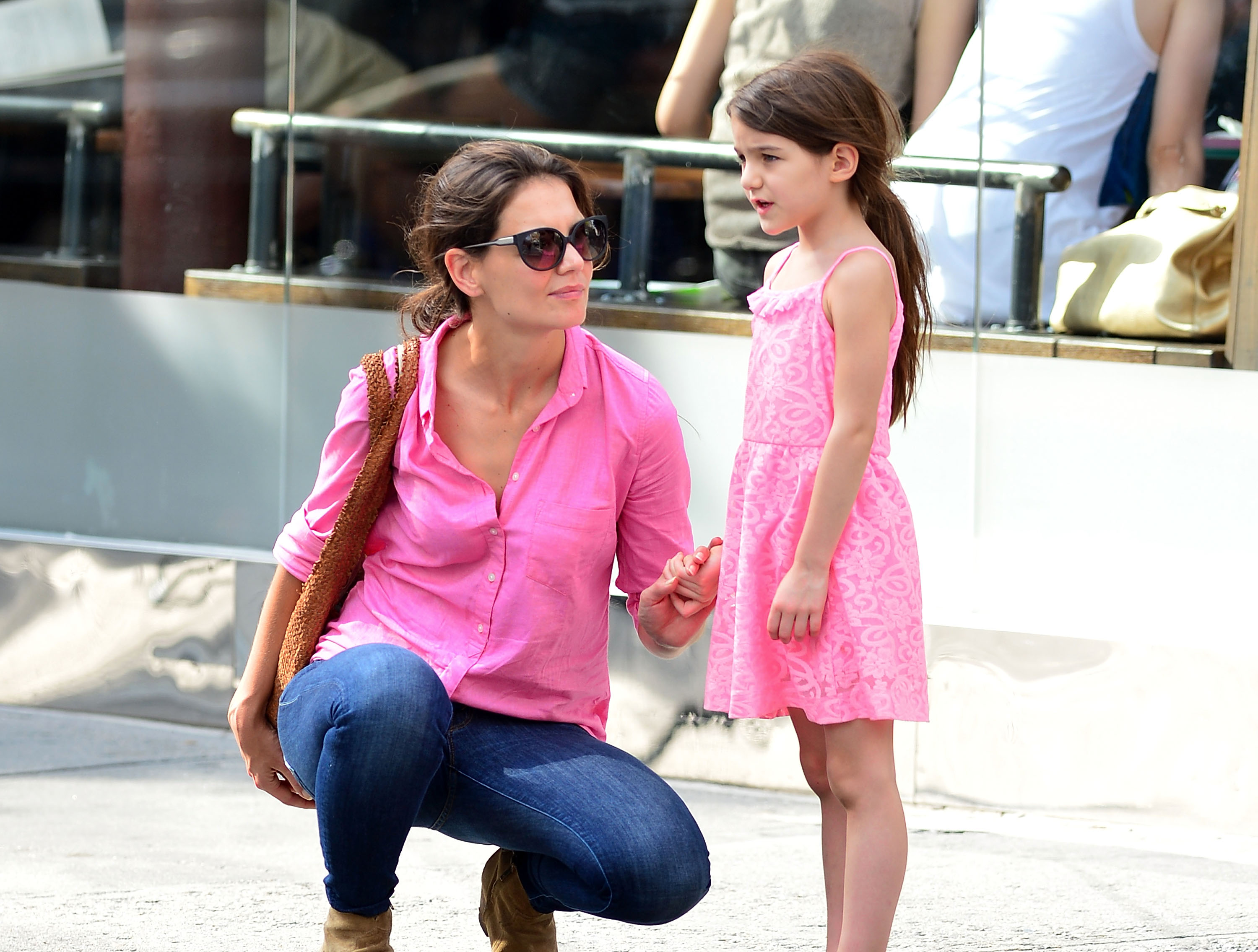 Katie Holmes and Suri Cruise both look serious in Manhattan on July 15, 2012 | Source: Getty Images