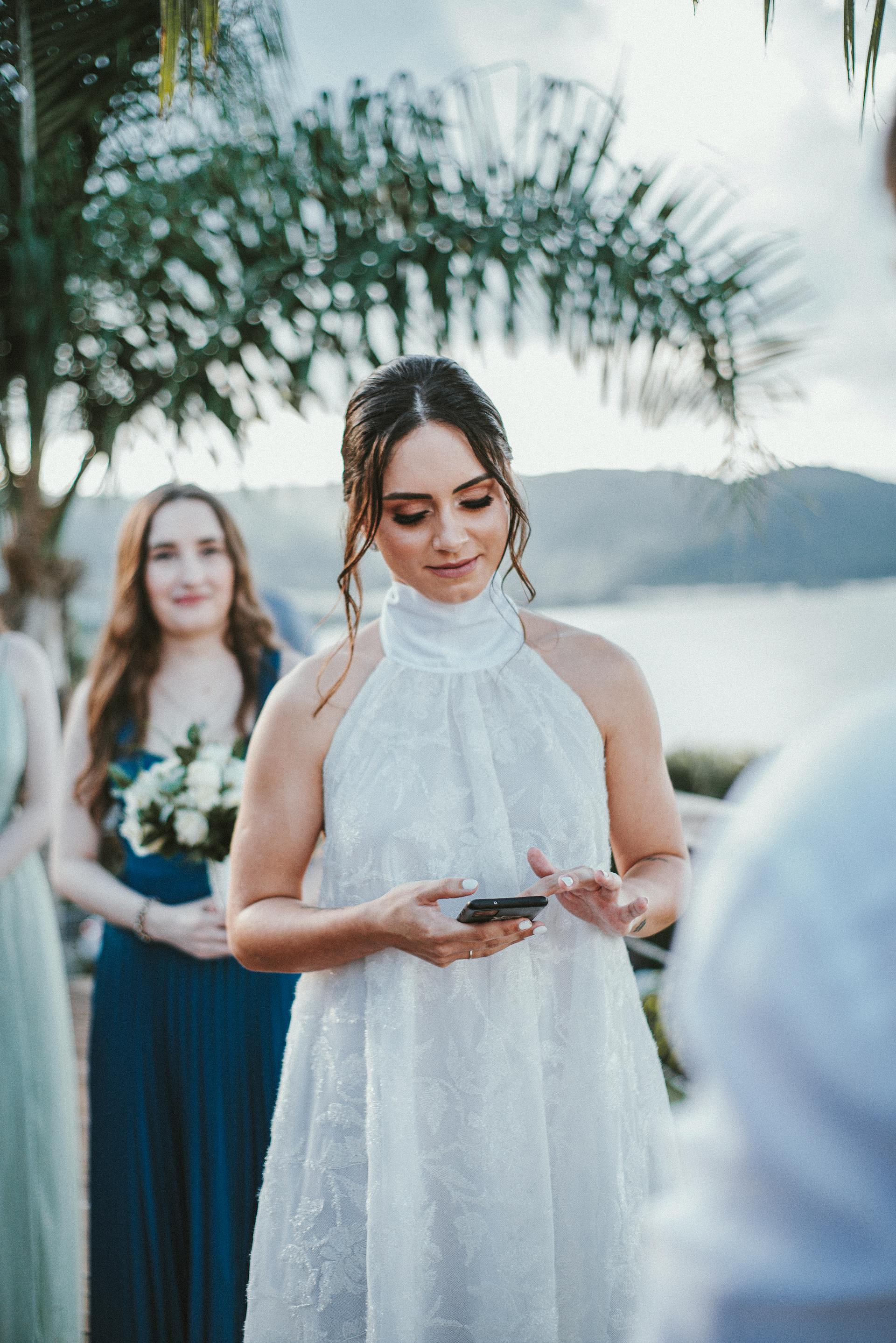 A bride checking her phone | Source: Pexels