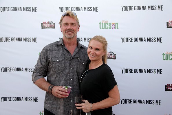 John Schneider and Alicia Allain at "You're Gonna Miss Me" premiere in Tucson, Arizona.| Photo: Getty Images.