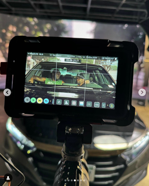 A camera monitor showing two actors looking at each other from inside a car. | Source: Instagram/alyshaburney_