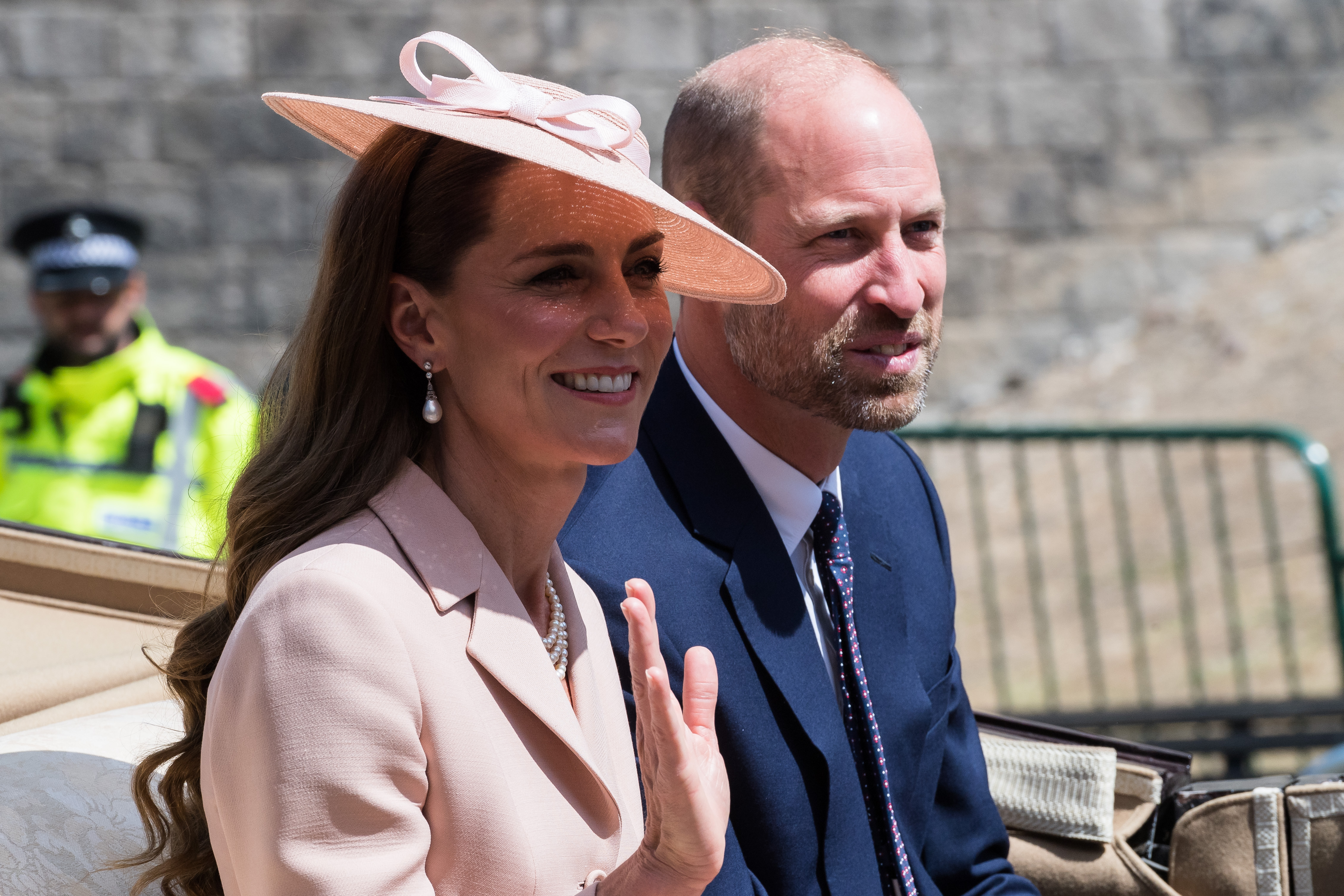 Princess Catherine and Prince William smiled warmly at well-wishers who gathered to greet them as they made their way to Windsor Castle.
