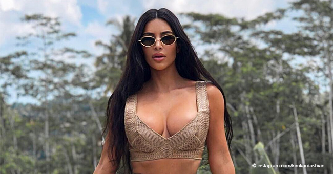 Kim Kardashian Bares Her Midriff in Snakeskin Bra and Curve-Hugging Mini Skirt