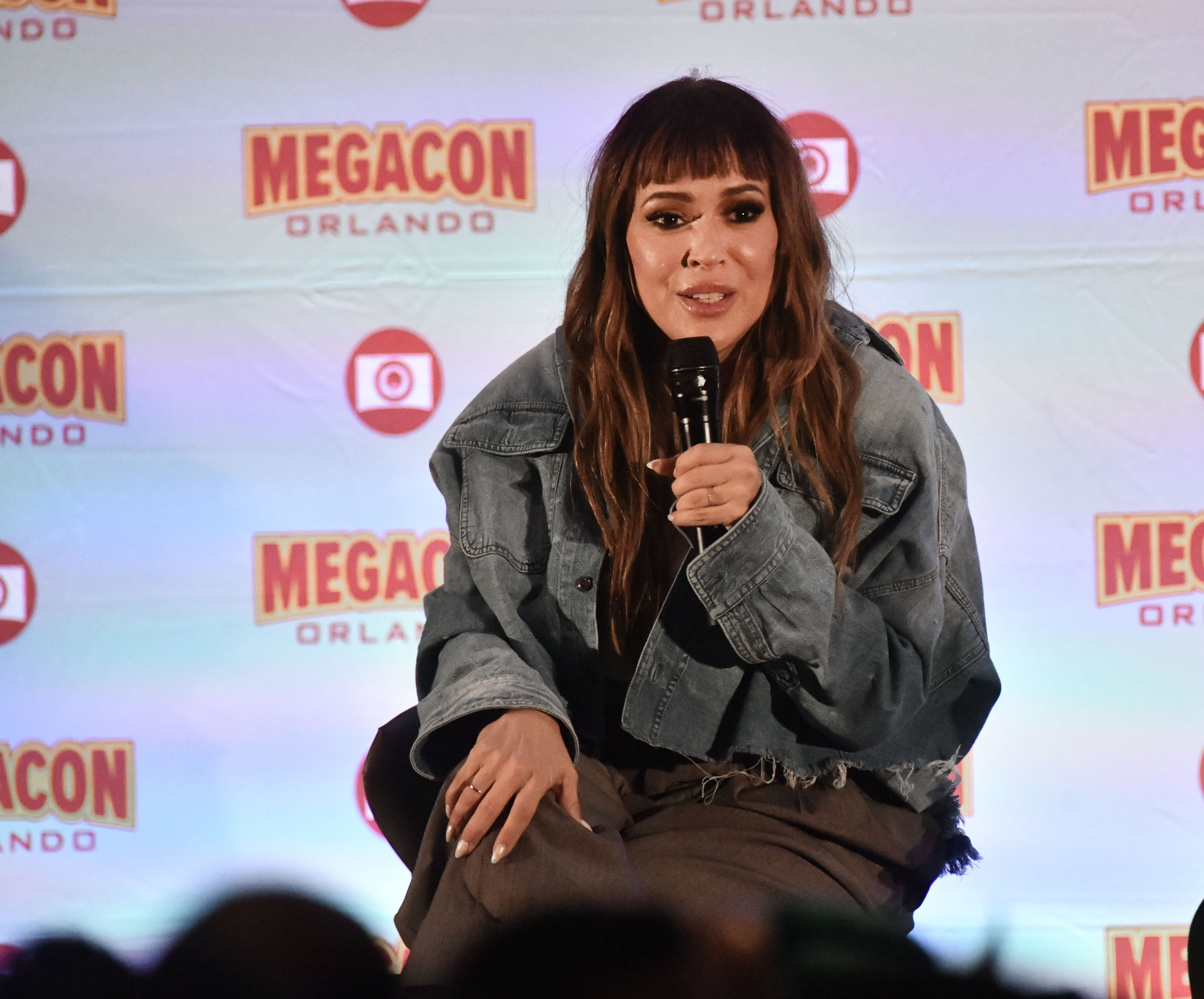 Alyssa Milano speaking at MegaCon Orlando 2024 at the Orange County Convention Center on February 2, 2024. | Source: Getty Images