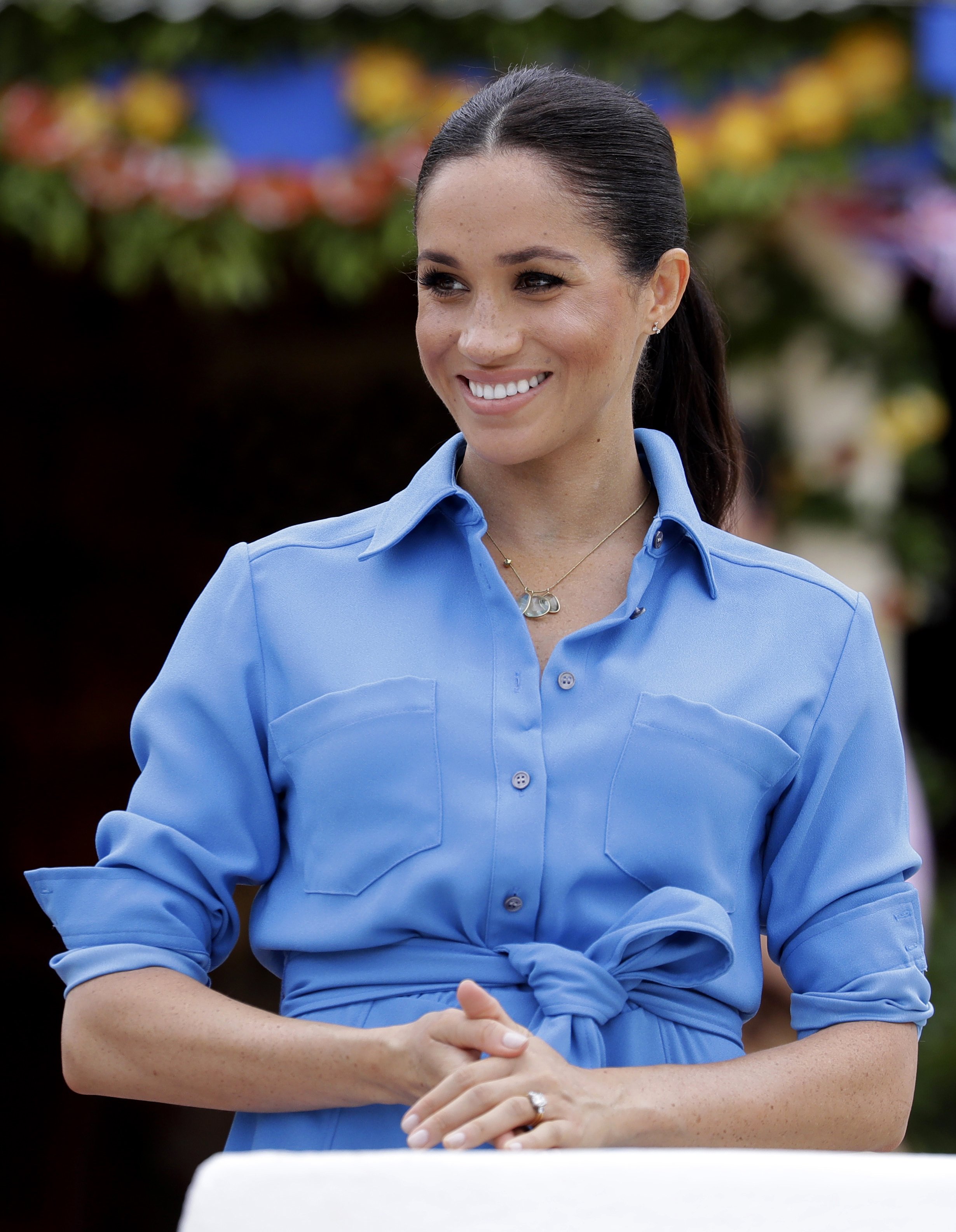 Meghan, Duchess of Sussex talks with students during a visit to Tupou College in Tonga on October 26, 2018 | Source: Getty Images