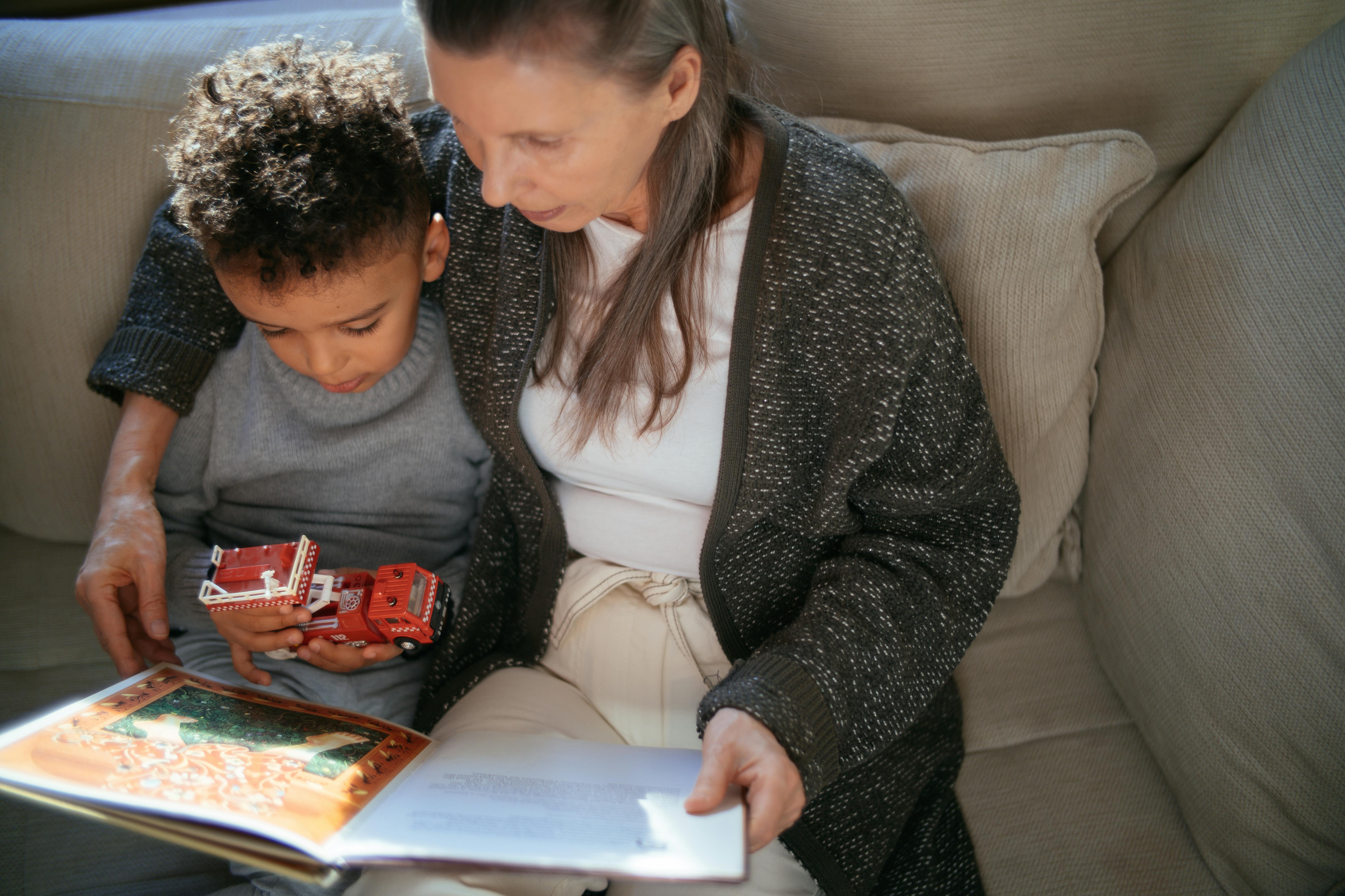 A woman spending time with her grandson instead of using her phone | Source: Pexels