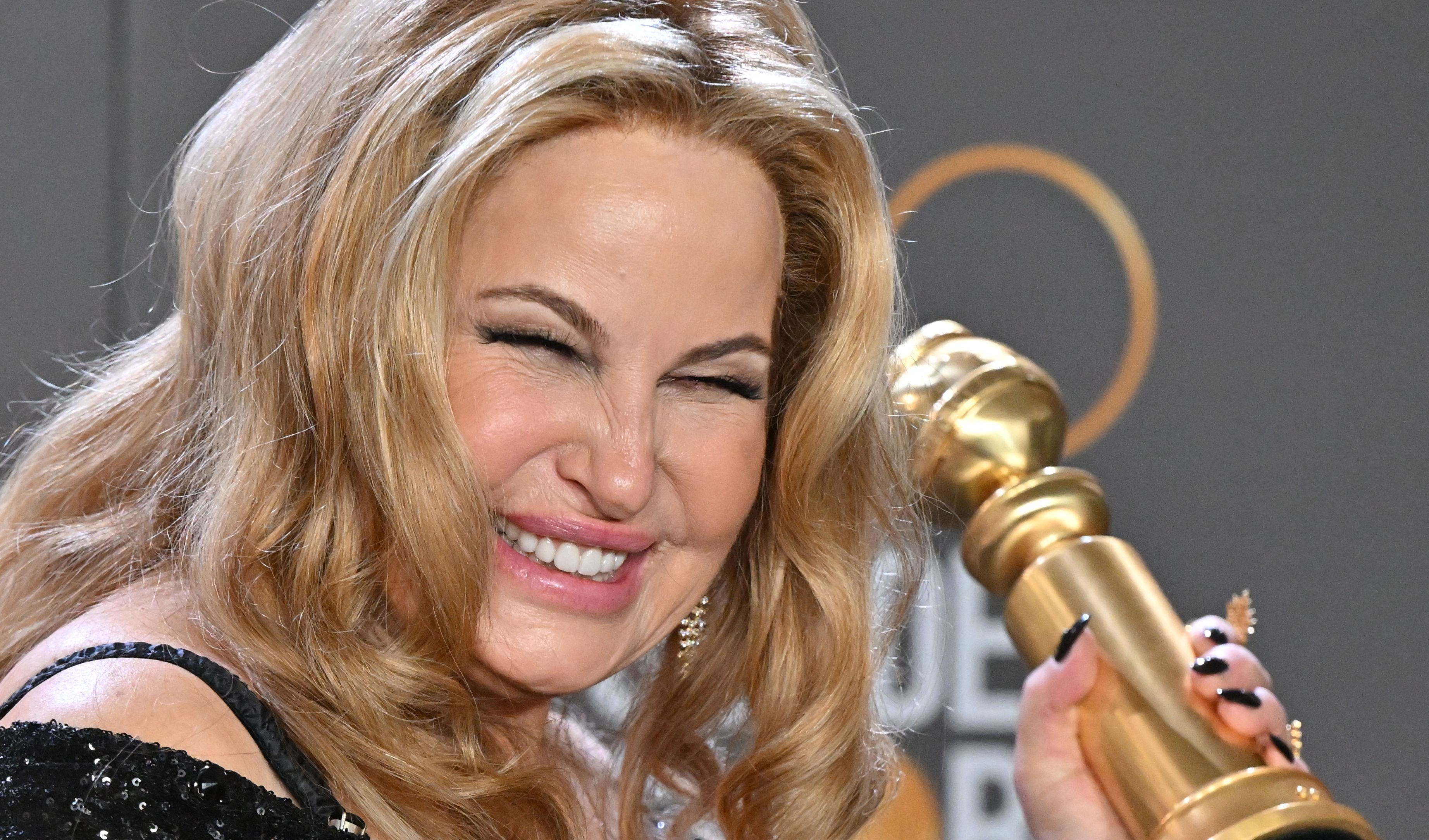Jennifer Coolidge poses with her award for Best Supporting Actress - Television Limited Series/Motion Picture for "The White Lotus" in the press room during the 80th annual Golden Globe Awards at The Beverly Hilton Hotel in Beverly Hills, California, on January 10, 2023. | Source: Getty Images
