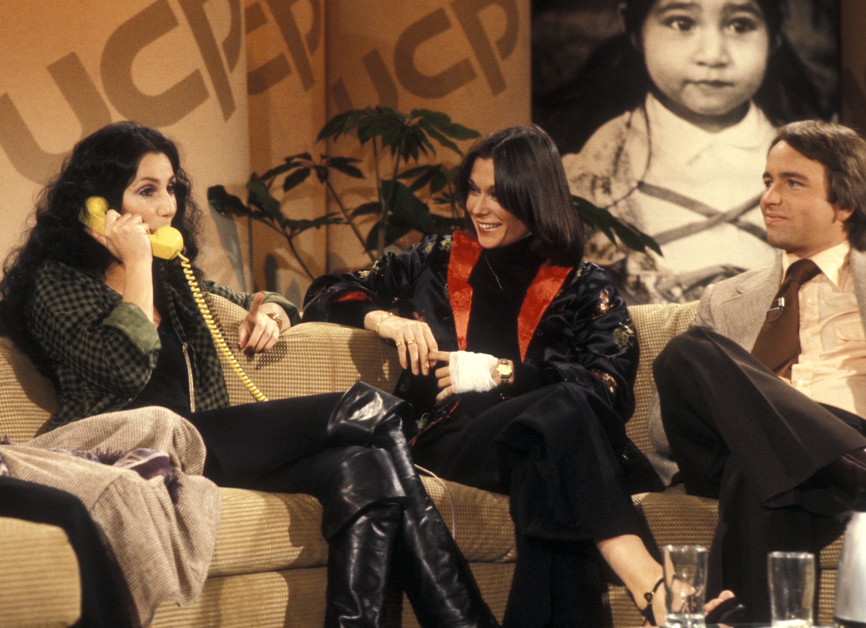 Kate Jackson participating in the United Cerebral Palsy's "Weekend with the Stars" Telelthon on February 4, 1978, with Cher and John Ritter | Source: Getty Images