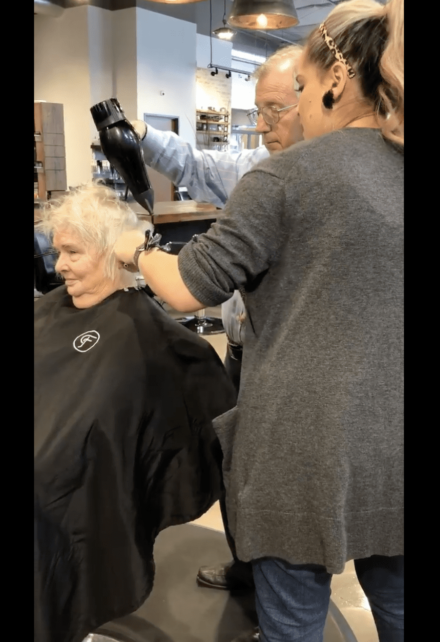 Andrew learns how to style his wife Theresa's hair. | Source: facebook.com/raigen.kelley