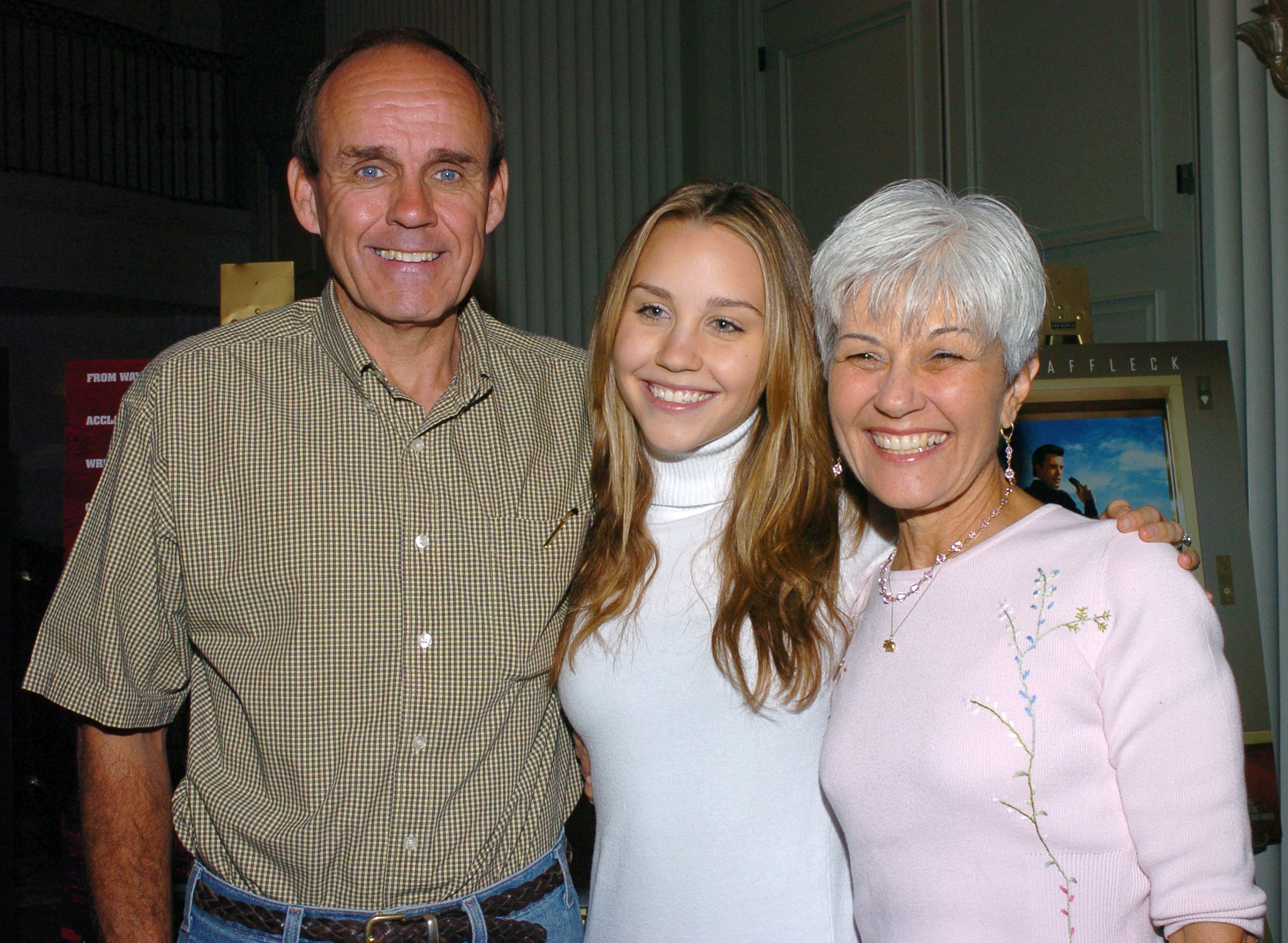 Amanda Bynes with parents at the American Film Market-Media 8 Breakfast on November 4, 2004. | Source: Getty Images