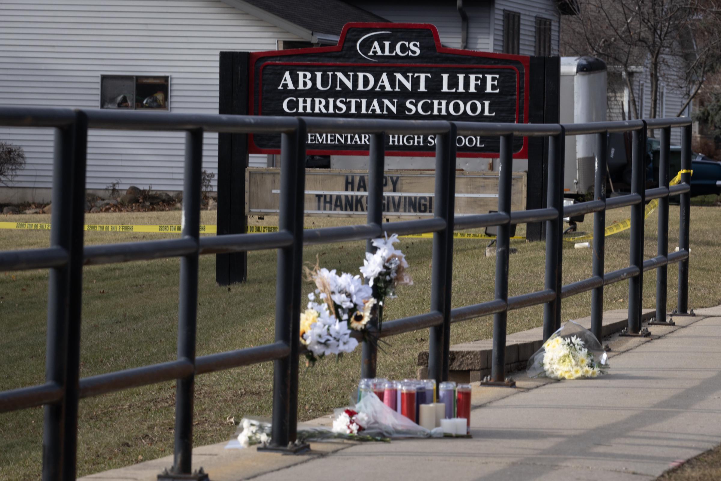 A memorial outside Abundant Life Christian School on December 17, 2024. | Source: Getty Images