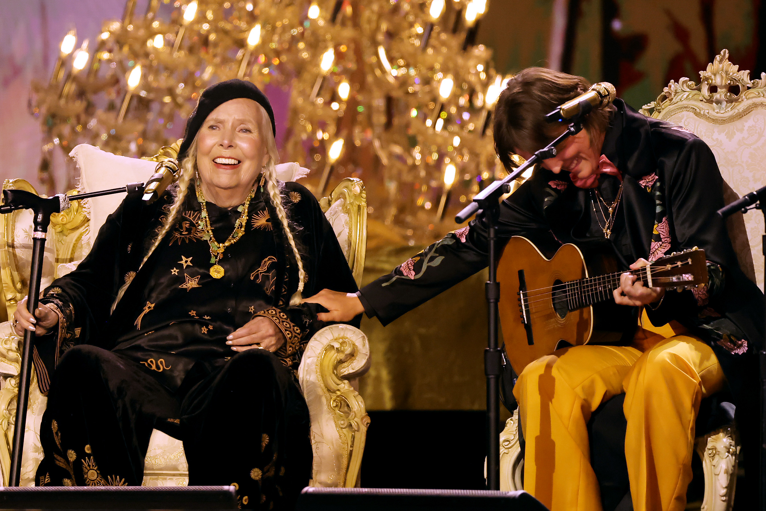 Joni Mitchell and Brandi Carlile onstage at the 66th GRAMMY Awards on February 04, 2024 | Source: Getty Images