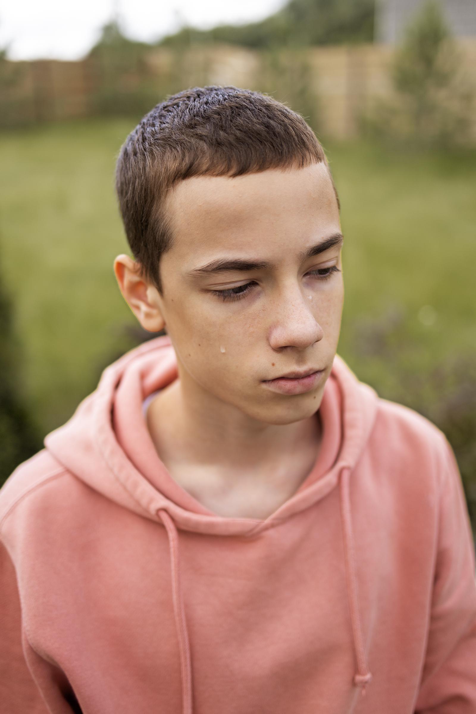 A crying teenager | Source: Freepik