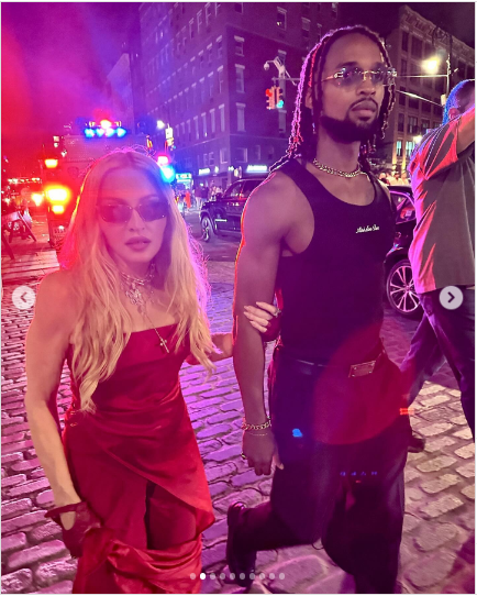 A photo of Madonna and Akeem walking in the streets posted on July 5, 2024 | Source: Instagram/madonna