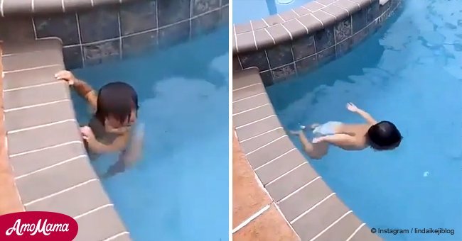 Cute 1-year-old can swim around the pool