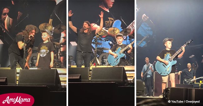 Little boy makes rock star throw up his hands as he stuns crowd with masterly guitar skills