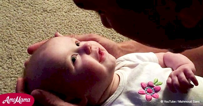Man sings classic song to his baby daughter and gets an adorable reaction